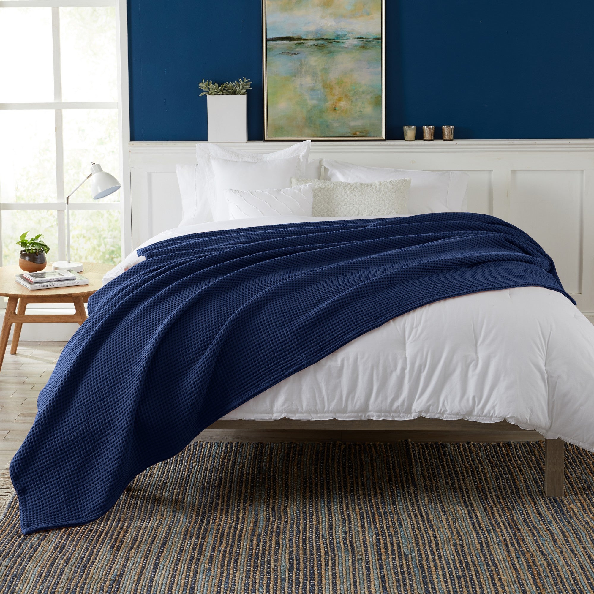 Brielle Collection Cotton Waffle Blanket by Market & Place featuring soft, breathable 100% cotton construction with a classic waffle weave texture. Available in multiple colors and shown folded, layered on beds, and in detailed fabric close-ups, highlighting its lightweight comfort and versatile year-round style.