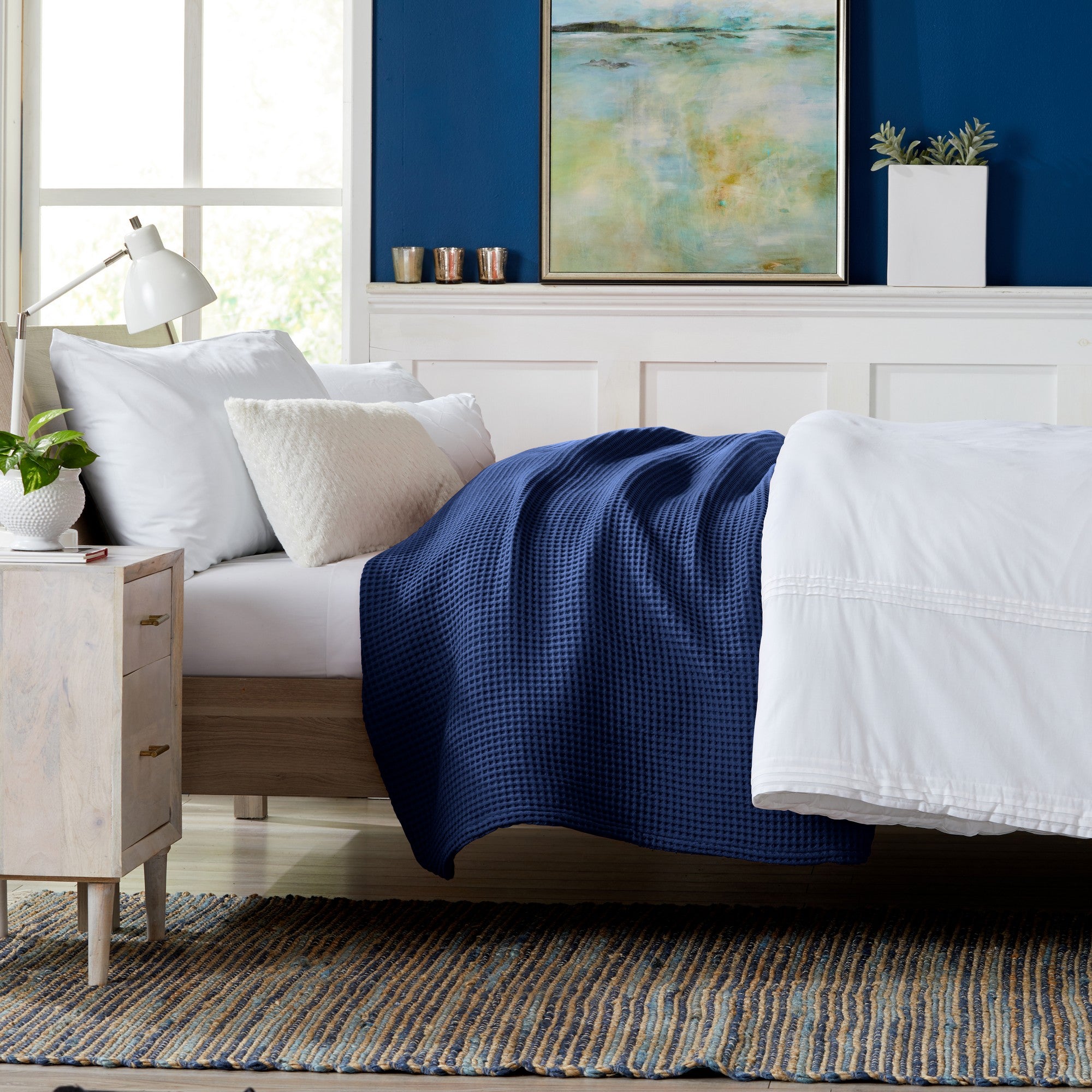 Brielle Collection Cotton Waffle Blanket by Market & Place featuring soft, breathable 100% cotton construction with a classic waffle weave texture. Available in multiple colors and shown folded, layered on beds, and in detailed fabric close-ups, highlighting its lightweight comfort and versatile year-round style.