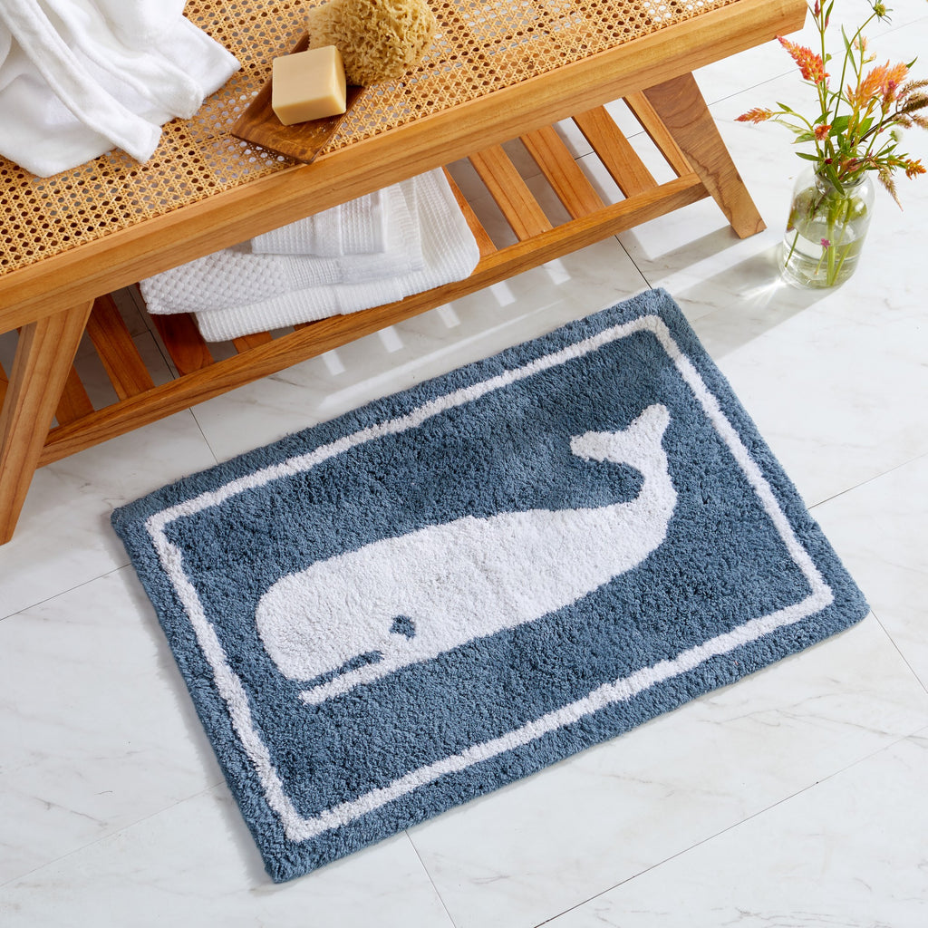 Plush tufted cotton bath rug featuring a fun decorative design with raised detailing. Soft, highly absorbent, and quick-drying, this 20 x 30 inch rug adds comfort and personality to any bathroom. Machine washable for easy care.