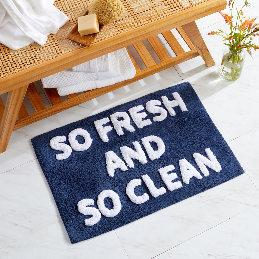 Plush tufted cotton bath rug featuring a fun decorative design with raised detailing. Soft, highly absorbent, and quick-drying, this 20 x 30 inch rug adds comfort and personality to any bathroom. Machine washable for easy care.