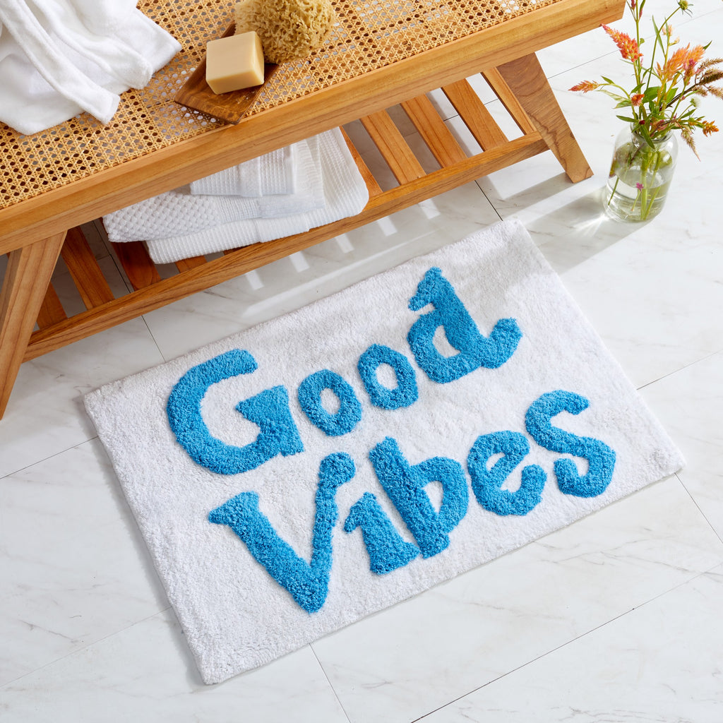 Plush tufted cotton bath rug featuring a fun decorative design with raised detailing. Soft, highly absorbent, and quick-drying, this 20 x 30 inch rug adds comfort and personality to any bathroom. Machine washable for easy care.