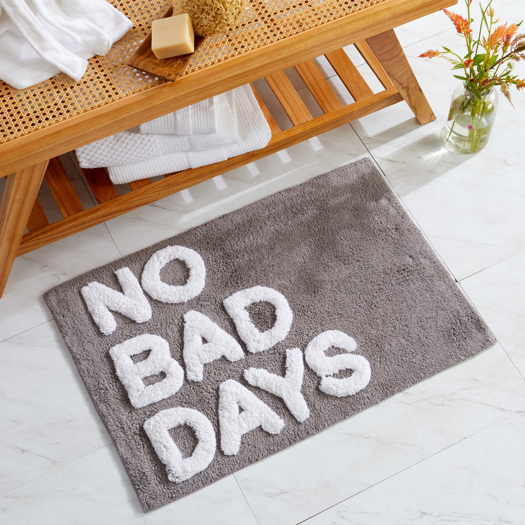 Plush tufted cotton bath rug featuring a fun decorative design with raised detailing. Soft, highly absorbent, and quick-drying, this 20 x 30 inch rug adds comfort and personality to any bathroom. Machine washable for easy care.