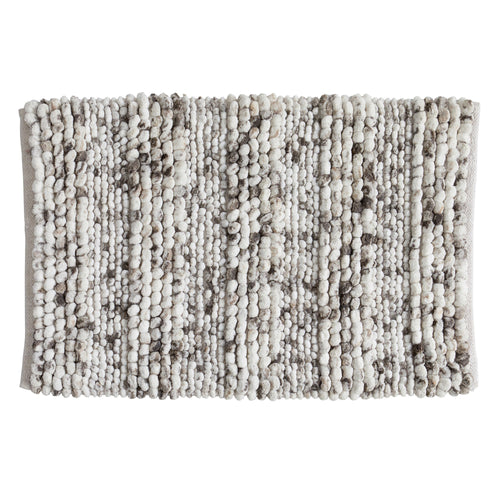 Space-dyed microfiber bath rug featuring a textured pebble-like surface in soft ivory and gray tones. The plush, absorbent design adds comfort underfoot while bringing subtle texture and modern style to any bathroom space.
