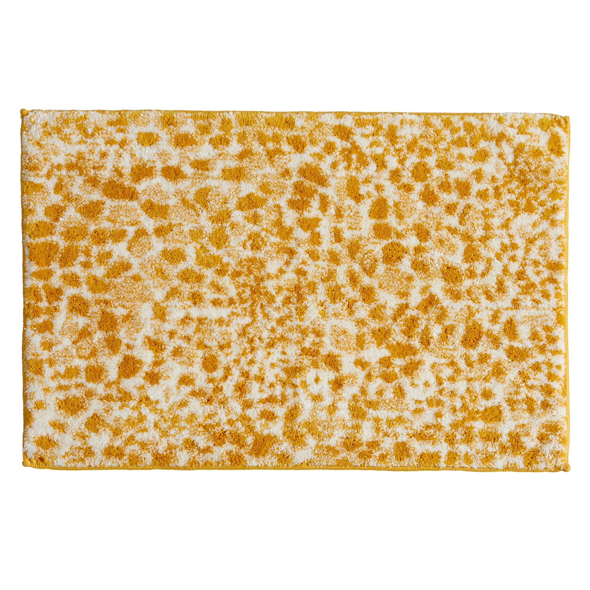 Rectangular bath rug featuring a bold cheetah-inspired pattern in mustard yellow and ivory. The plush, textured design adds a vibrant animal-print accent to modern and eclectic bathroom décor while providing soft, absorbent comfort underfoot.