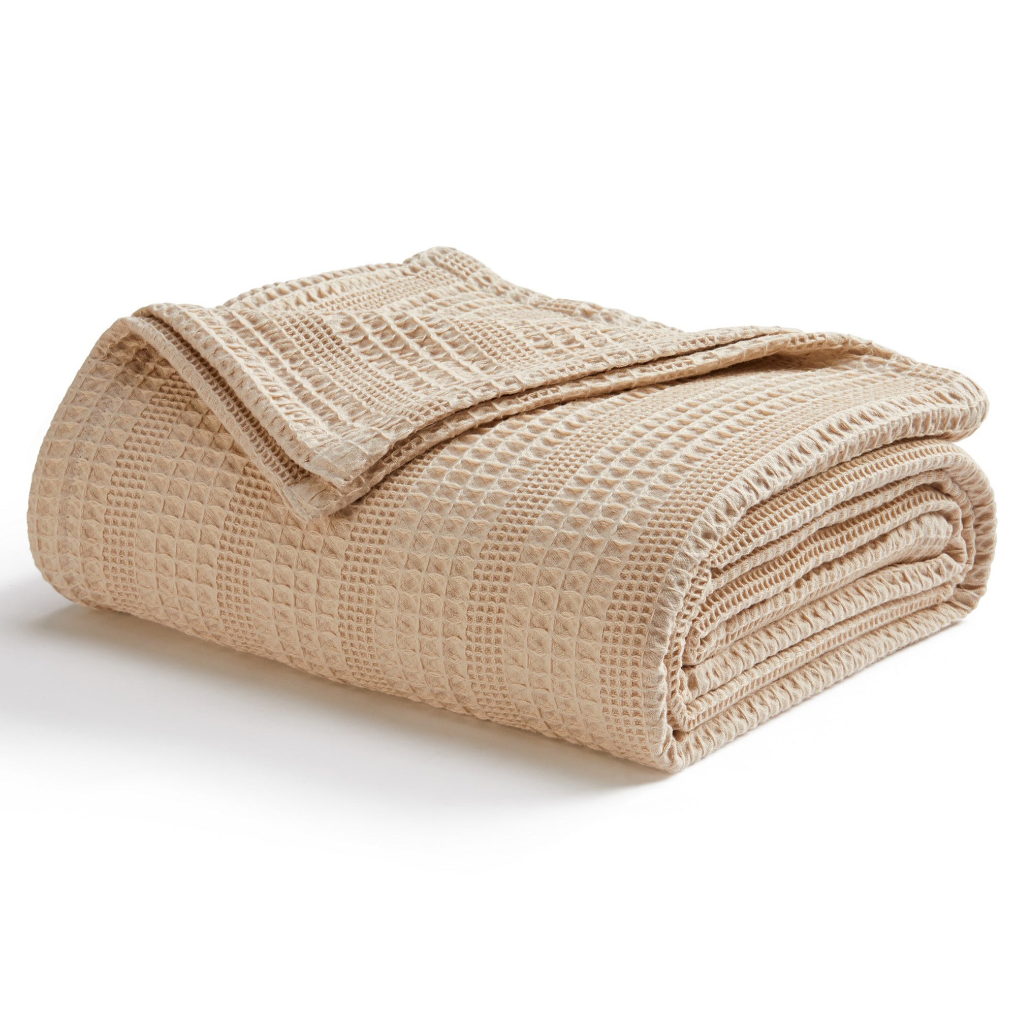 Soft and breathable 100% cotton waffle weave blanket, shown layered on a bed or folded for display. Lightweight and versatile, this textured blanket adds casual comfort and timeless style to any bedroom or living space. Available in Full/Queen and King sizes.