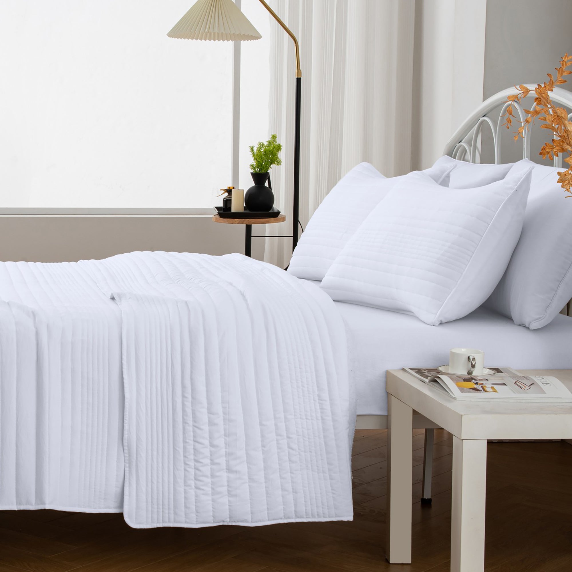 Parker Collection Solid Embroidered Quilt Set by Market & Place featuring soft microfiber construction and elegant channel embroidery. Available in multiple colors with coordinating shams and detailed fabric close-ups, styled in a modern bedroom setting.