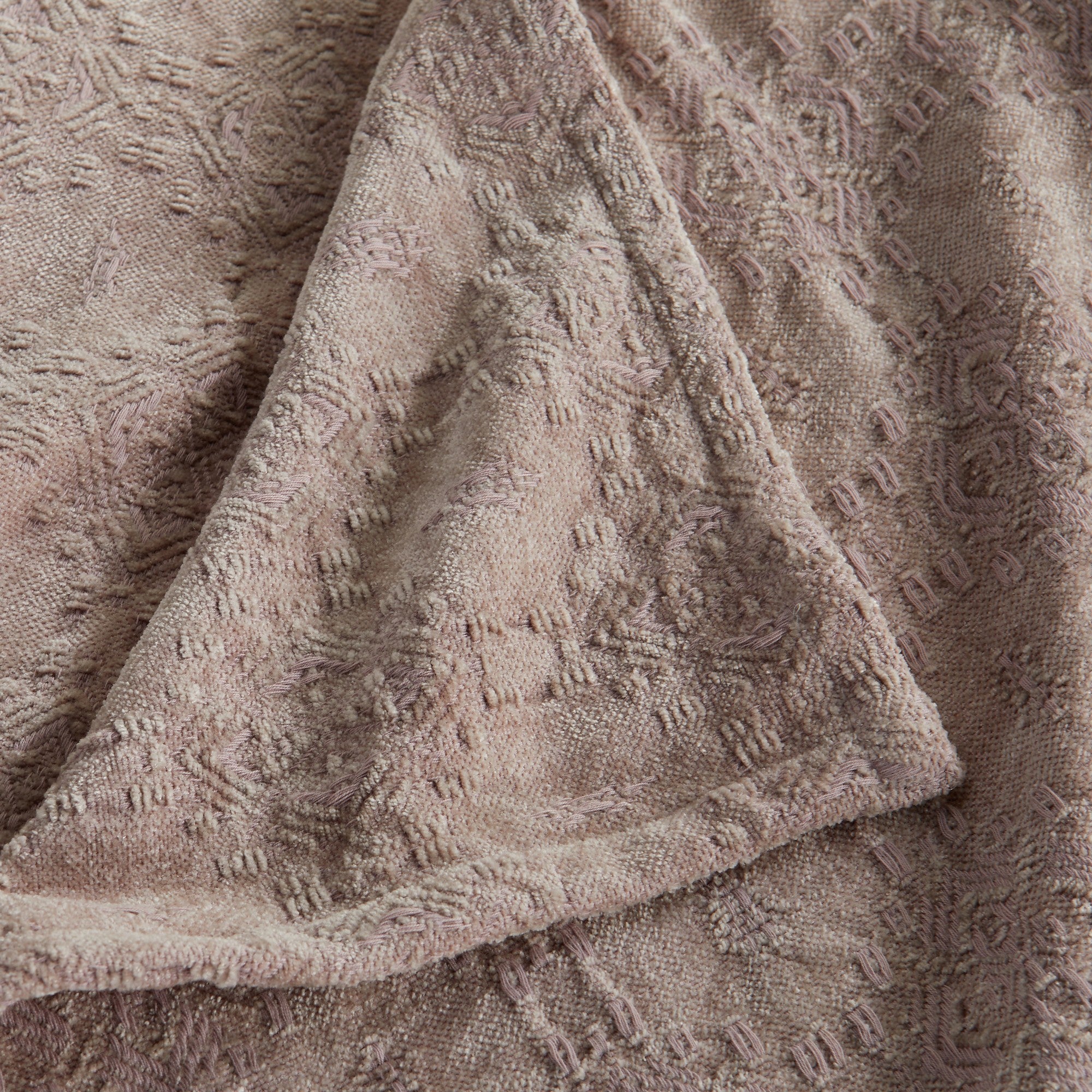 Close-up of the Grey Charlotte Collection Chenille Jacquard Throw Blanket highlighting its plush chenille texture, woven jacquard pattern, and decorative hem detail.
