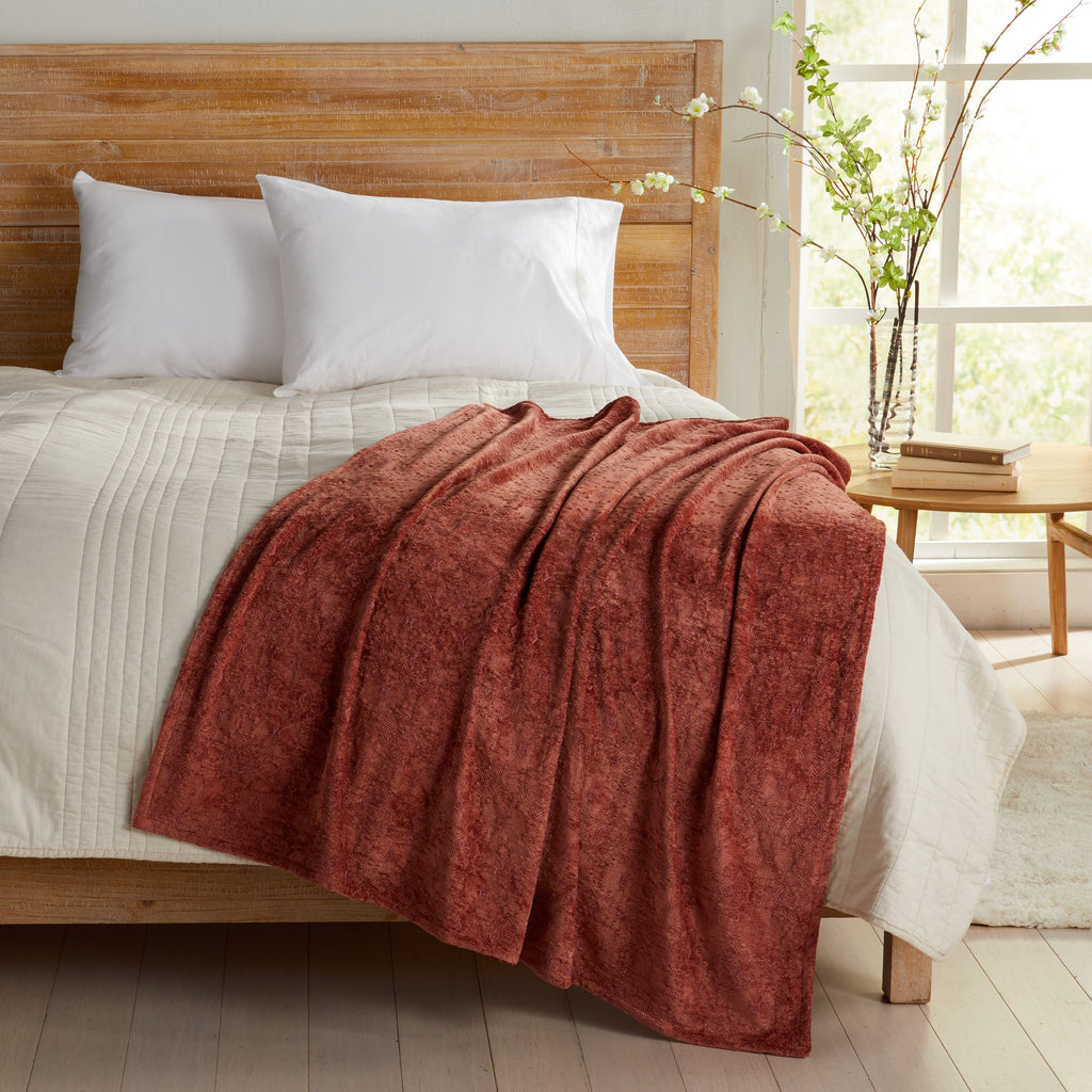 Rose Charlotte Collection Chenille Jacquard Throw Blanket draped across bed, soft textured chenille fabric adding warmth and comfort to farmhouse, cottage, and modern bedroom décor.