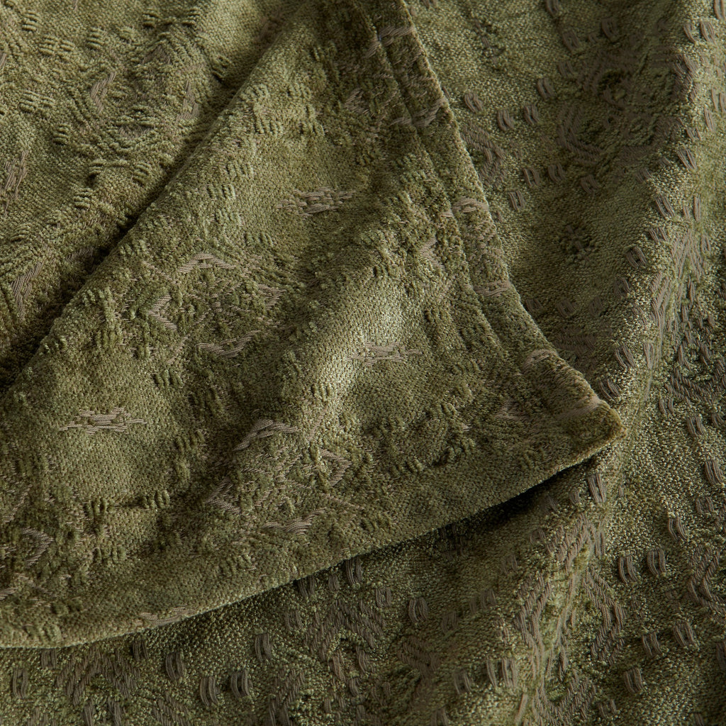 Close-up of the Sage Charlotte Collection Chenille Jacquard Throw Blanket highlighting its plush chenille texture, woven jacquard pattern, and decorative finished edge.