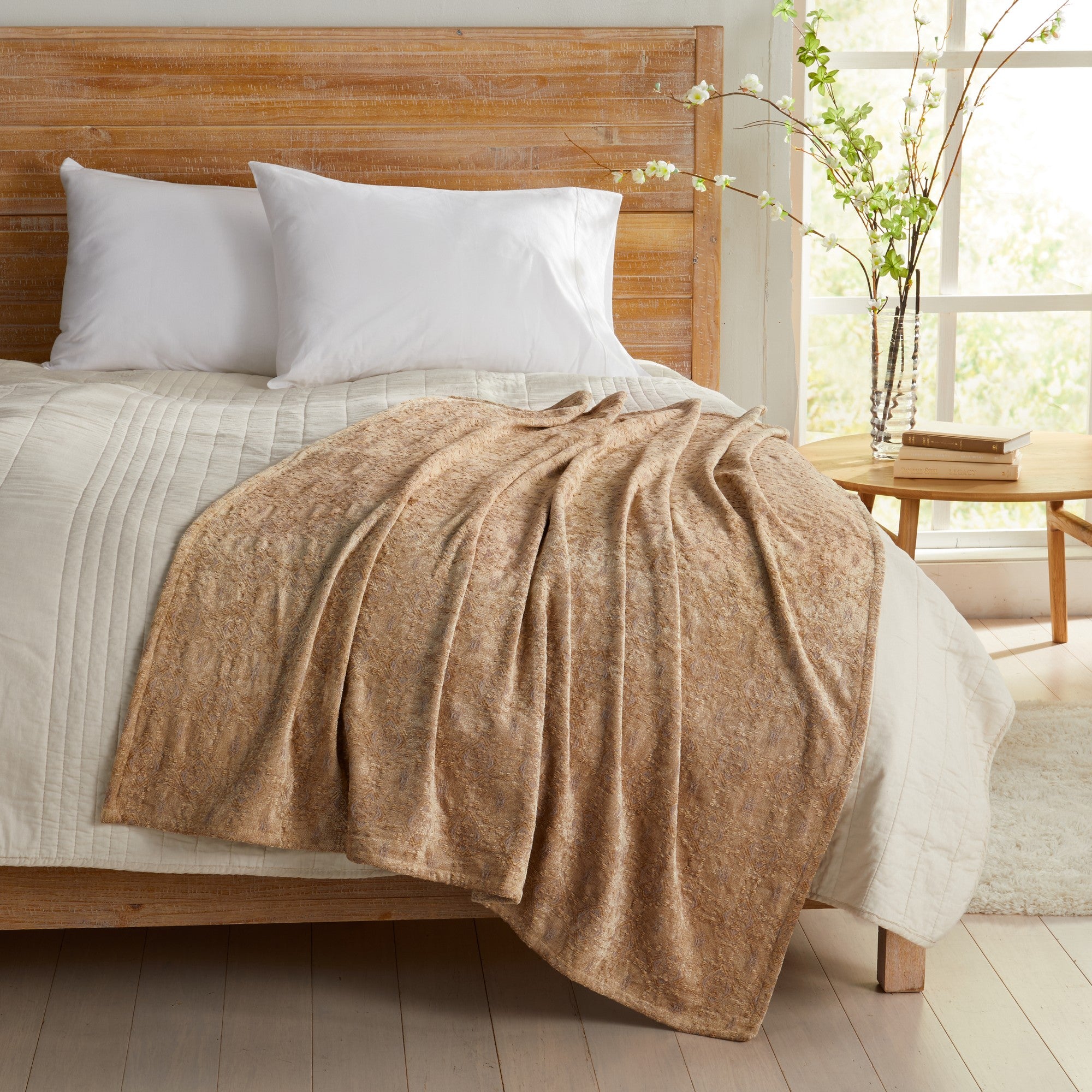 Beige Charlotte Collection Chenille Jacquard Throw Blanket draped across bed, soft textured chenille fabric adding warmth and comfort to farmhouse, coastal, and contemporary bedroom décor.