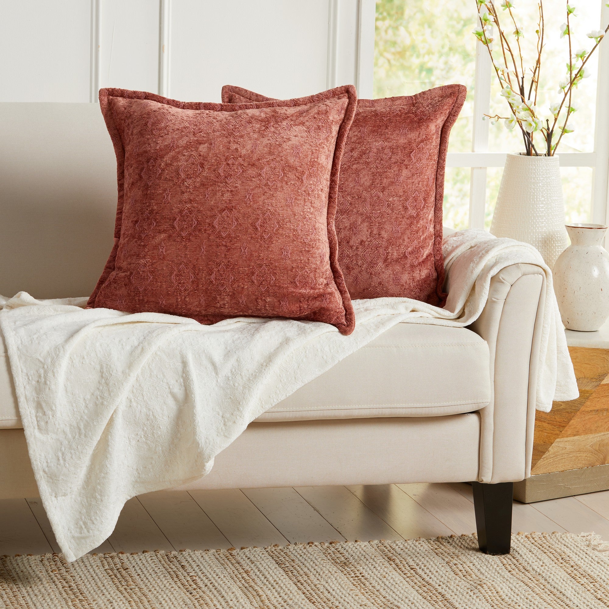 Rust chenille jacquard decorative pillow covers set of 2 displayed on an accent chair, soft textured throw pillow covers for living room and bedroom decor