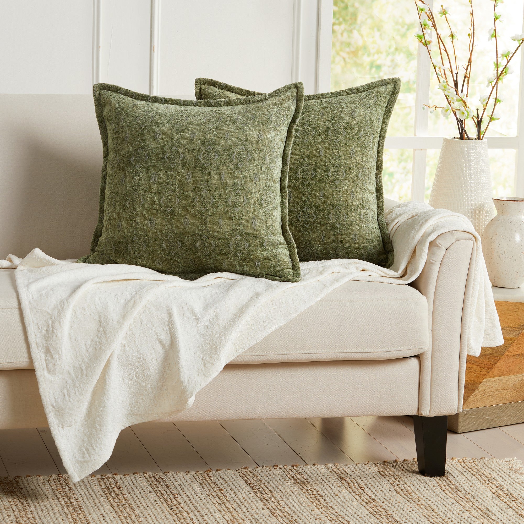 Sage green chenille jacquard decorative pillow covers set of 2 displayed on an accent chair, soft textured throw pillow covers for living room and bedroom decor