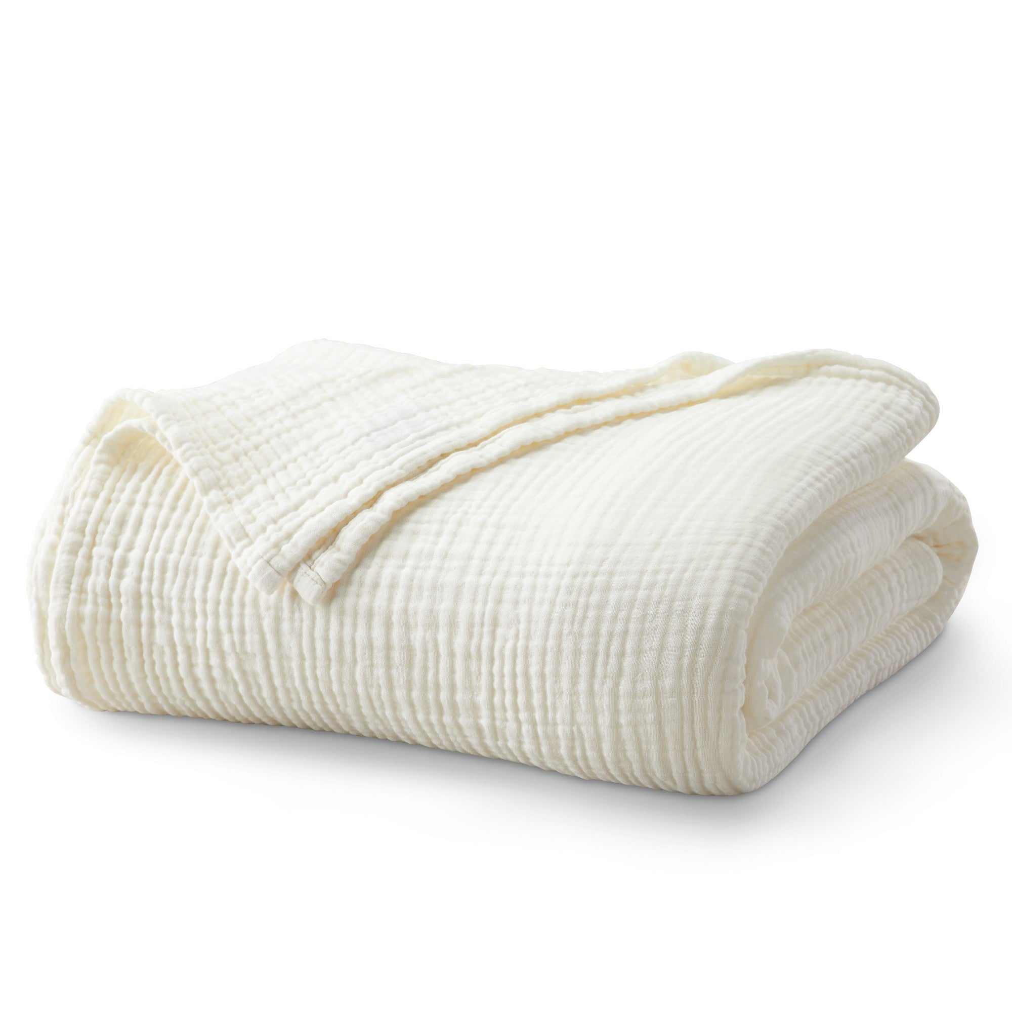 Folded Off-White Maria Collection cotton muslin blanket, featuring a soft textured muslin weave and lightweight construction, neatly displayed to showcase its cozy, breathable design.