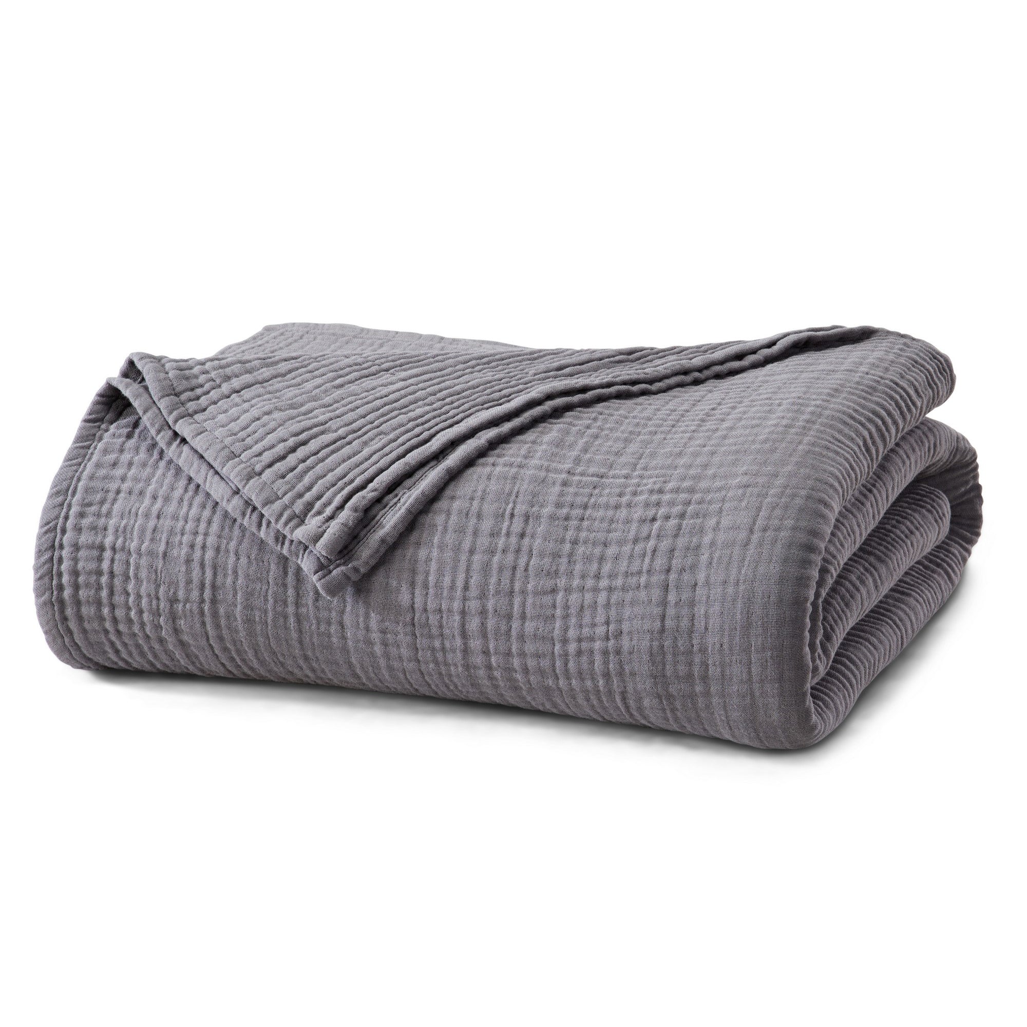Folded Charcoal Maria Collection cotton muslin blanket featuring a soft textured muslin weave and lightweight design, neatly displayed to showcase its breathable comfort and relaxed, modern style.