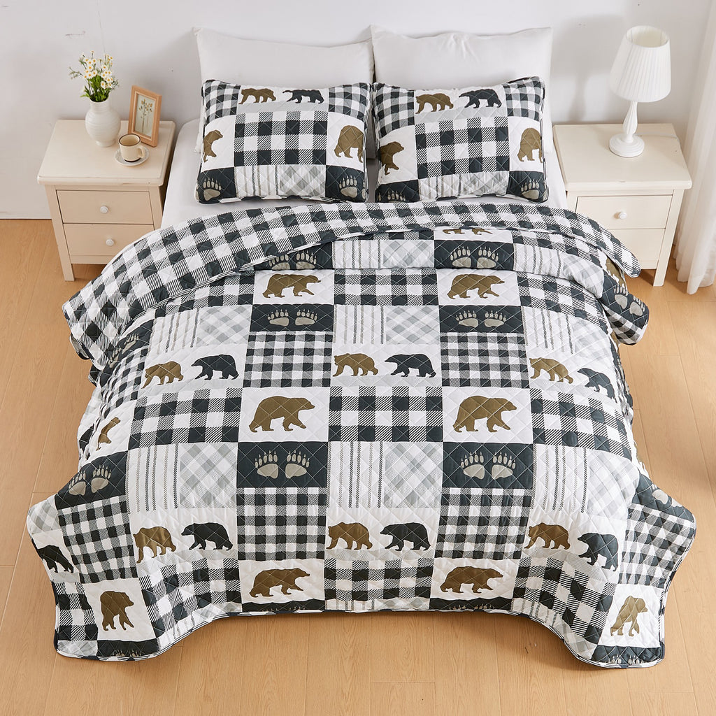 Orson Collection Lodge Quilt Set by Market & Place featuring soft microfiber construction and rustic lodge-inspired patchwork designs with plaid patterns and wildlife motifs. Coordinating shams and detailed fabric close-ups are shown in cozy bedroom settings, highlighting the reversible design and year-round comfort.