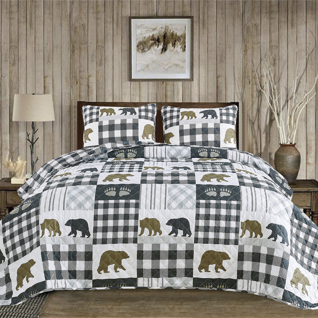 Orson Collection Lodge Quilt Set by Market & Place featuring soft microfiber construction and rustic lodge-inspired patchwork designs with plaid patterns and wildlife motifs. Coordinating shams and detailed fabric close-ups are shown in cozy bedroom settings, highlighting the reversible design and year-round comfort.
