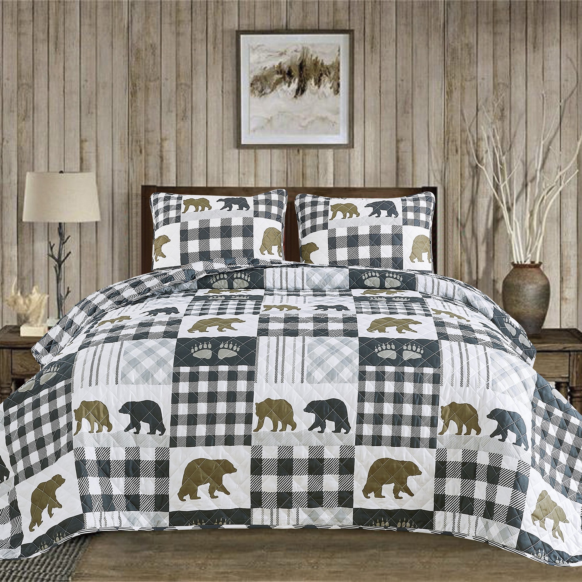 Orson Collection Lodge Quilt Set by Market & Place featuring soft microfiber construction and rustic lodge-inspired patchwork designs with plaid patterns and wildlife motifs. Coordinating shams and detailed fabric close-ups are shown in cozy bedroom settings, highlighting the reversible design and year-round comfort.