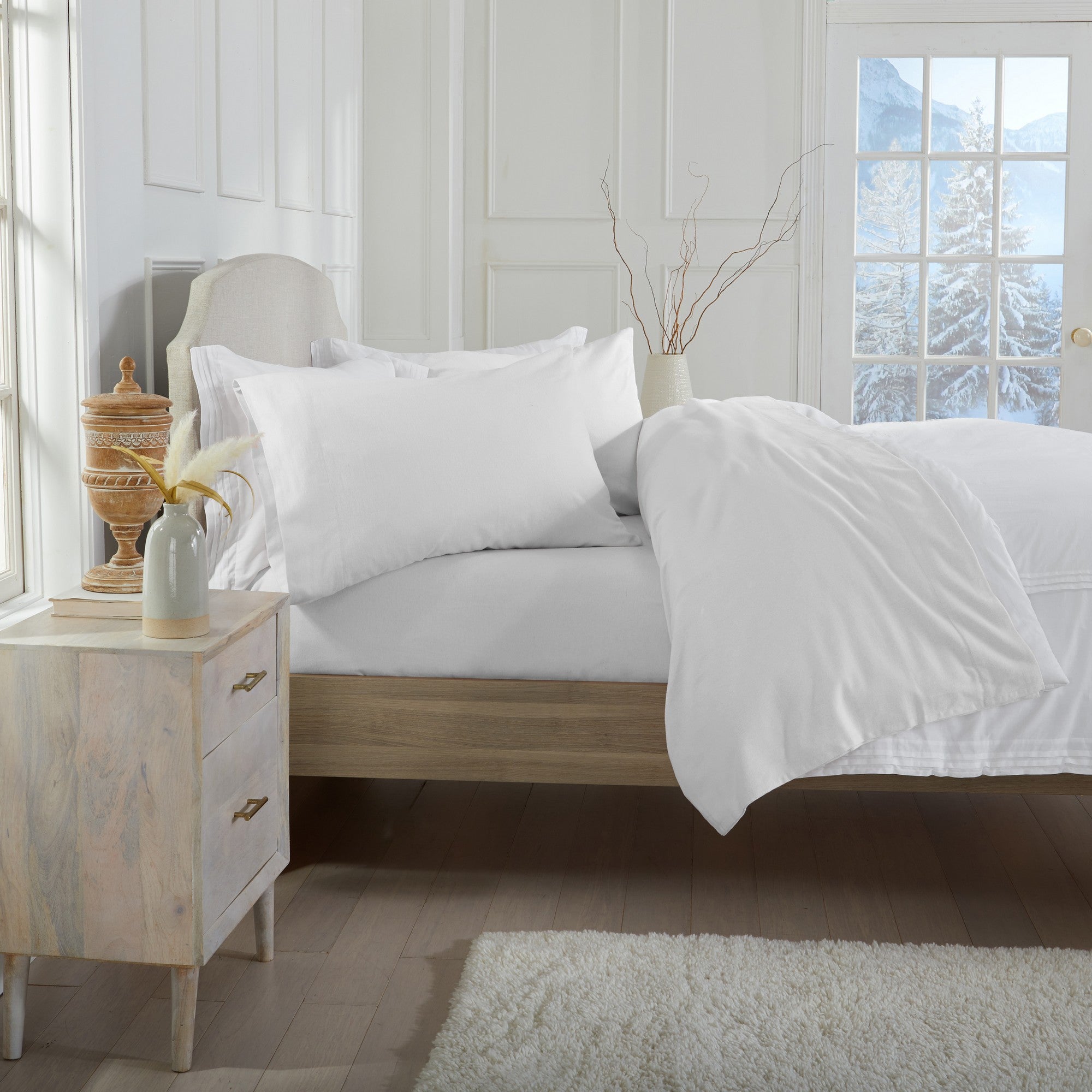Chalet Collection Solid Flannel Sheet Set in assorted solid colors, featuring ultra-soft 100% Turkish cotton flannel bedding with coordinating pillowcases and fitted sheets, shown styled on beds and folded for detail views.