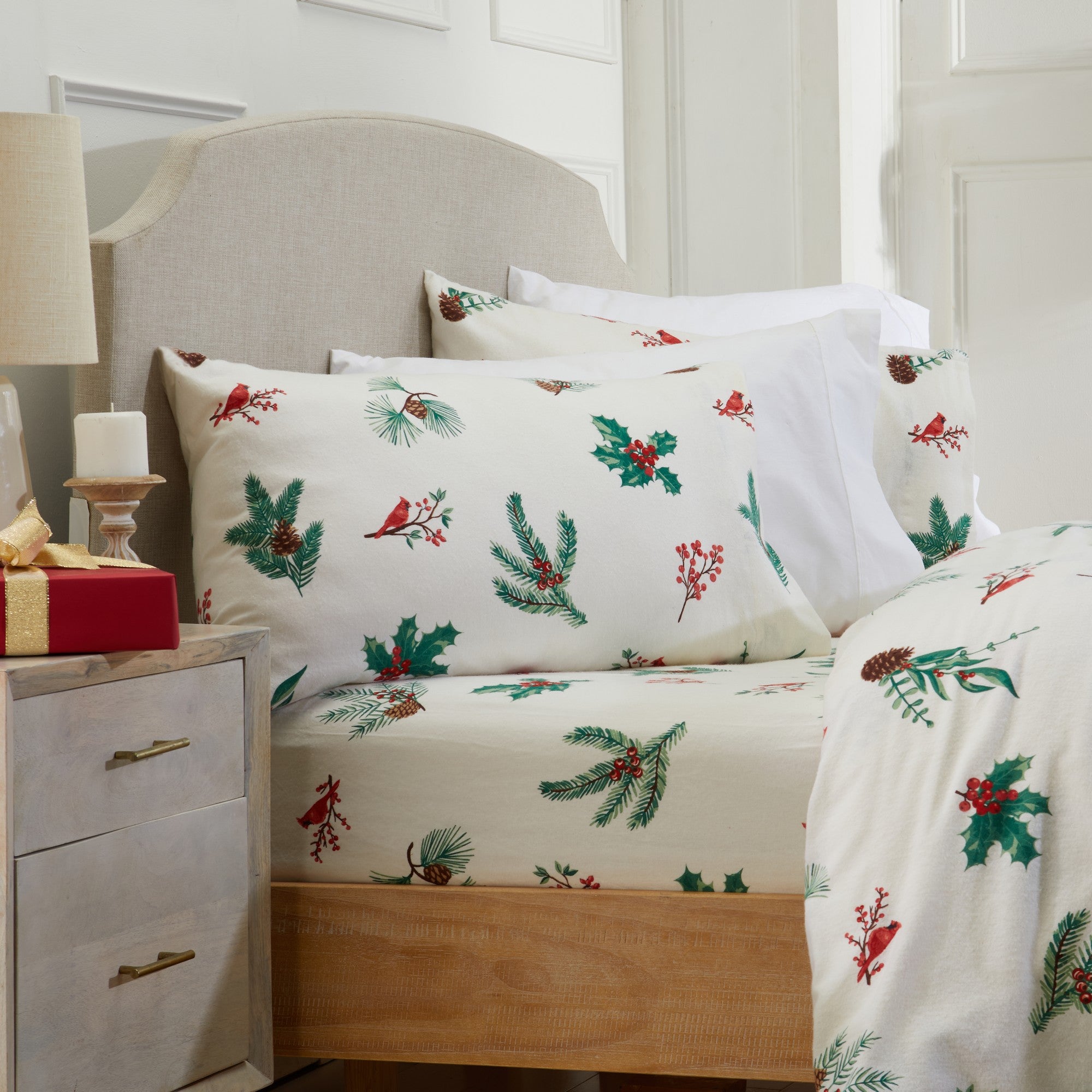 Printed 100% Turkish cotton flannel sheet set featuring assorted winter-inspired patterns, including woodland animals, snowflakes, trees, plaids, and seasonal motifs. Soft, cozy bedding shown in styled bedroom settings with close-up fabric details and folded sheet stacks in multiple designs.