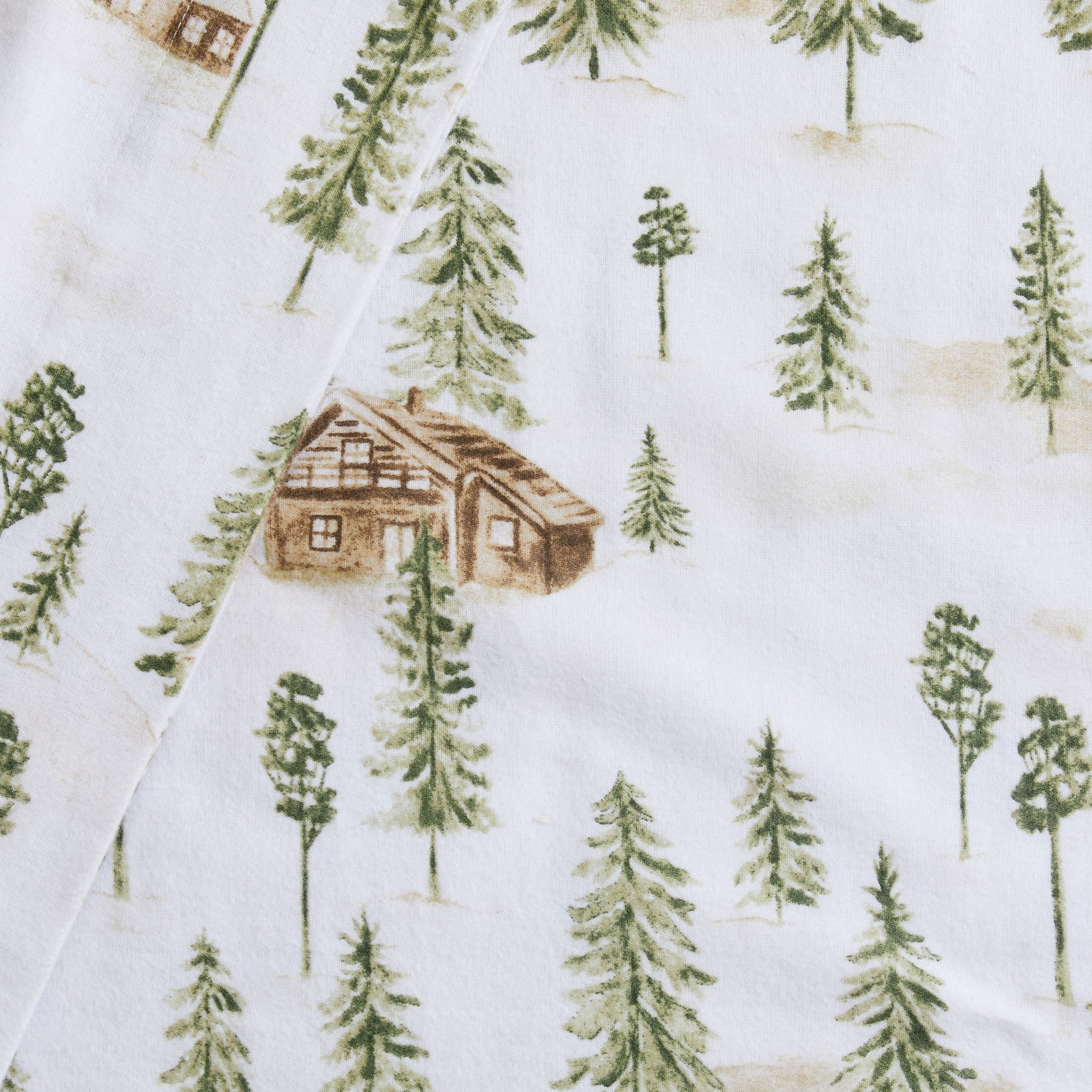Printed 100% Turkish cotton flannel sheet set featuring assorted winter-inspired patterns, including woodland animals, snowflakes, trees, plaids, and seasonal motifs. Soft, cozy bedding shown in styled bedroom settings with close-up fabric details and folded sheet stacks in multiple designs.