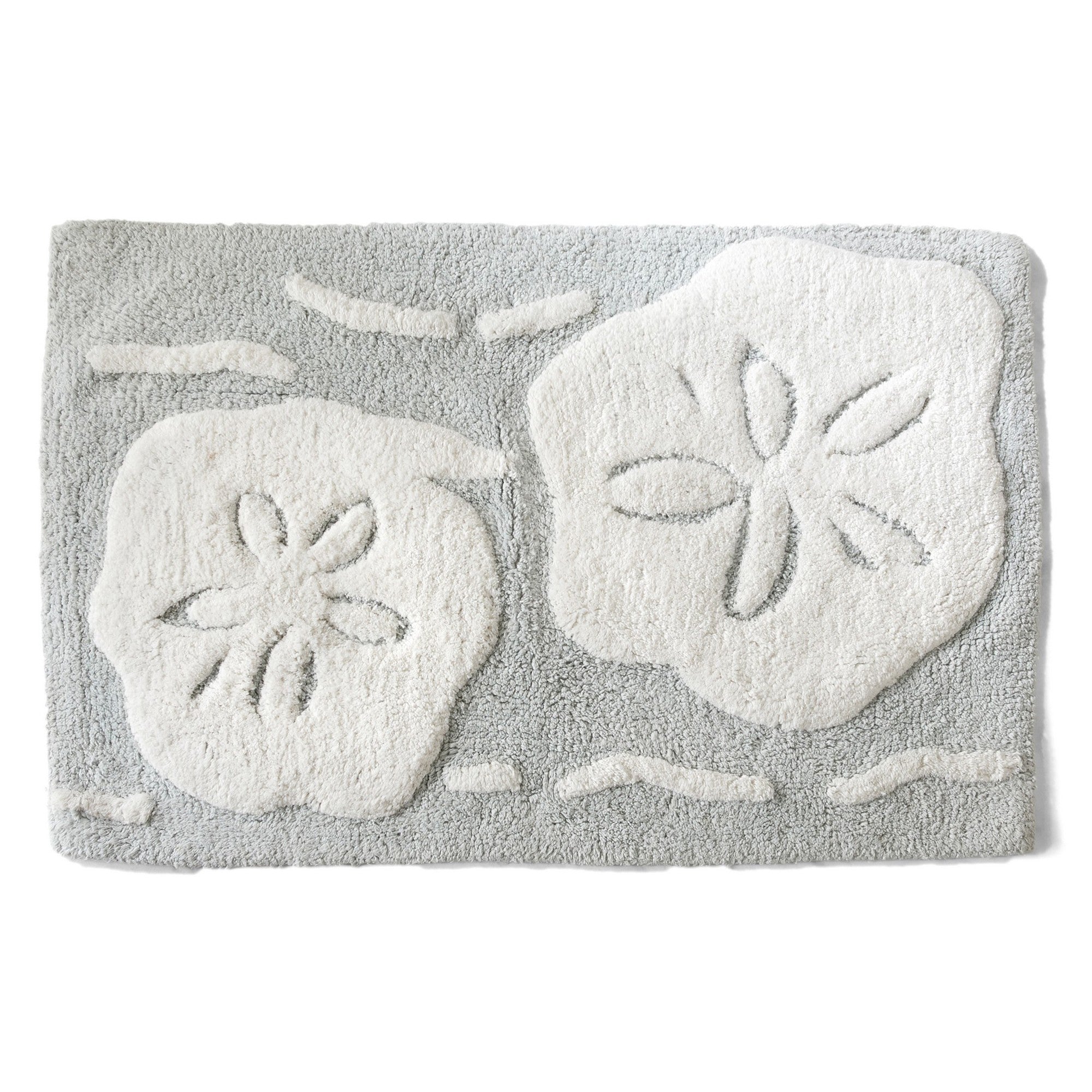 Gray bath mat with sand dollar designs on a white background