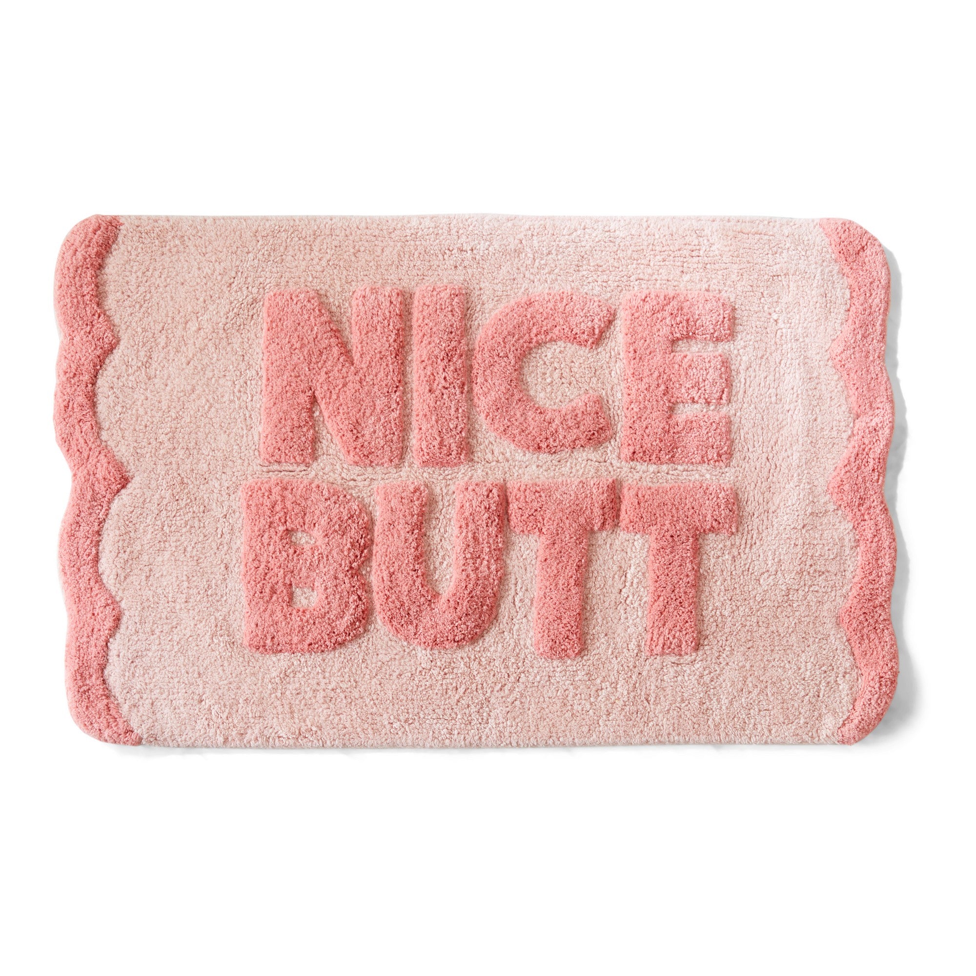 Pink bath mat with 'NICE BUTT' text on a white background