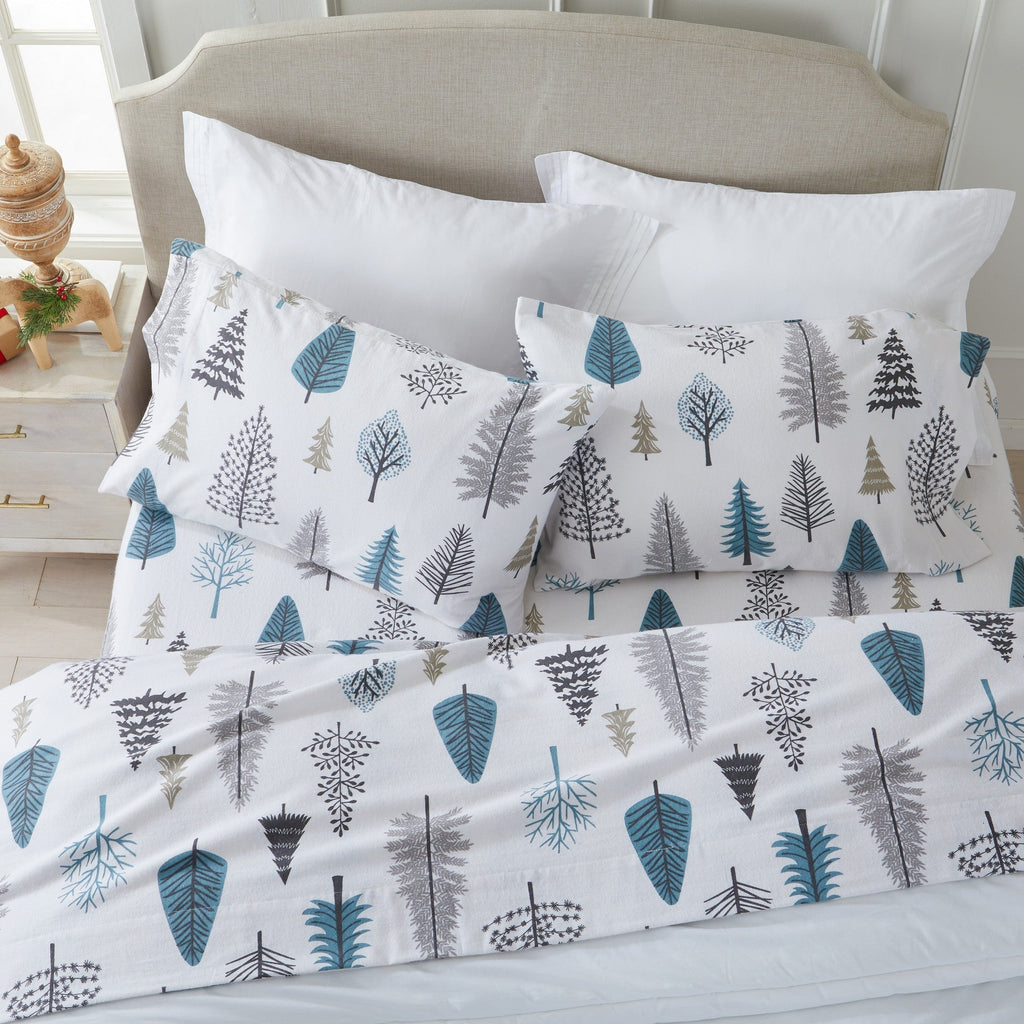Ultra-soft 100% Turkish cotton flannel sheet set featuring cozy winter-inspired patterns. Warm, breathable, and designed for year-round comfort, with a fully elasticized fitted sheet for a secure fit.