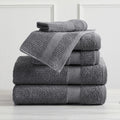 Roda Collection Cotton Ribbed Bath Towels by Market & Place featuring premium 100% cotton construction with a textured ribbed weave. Available in multiple colors and set configurations, including bath towels, hand towels, and washcloths, shown folded, stacked, and styled to highlight their soft, plush, and highly absorbent design.