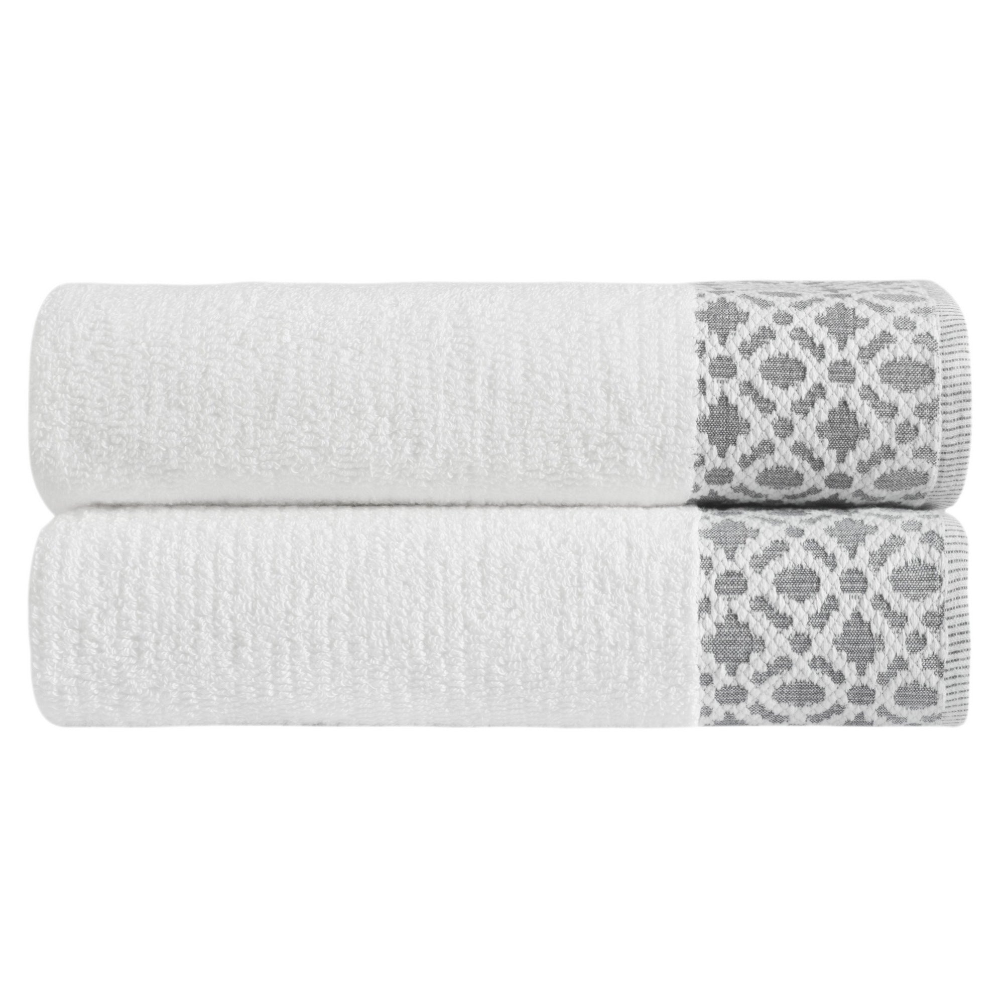 Nitra Collection Cotton Luxury Bath Towels by Market & Place featuring premium 100% cotton construction with an elegant geometric dobby border. Available in multiple colors and set configurations, including bath towels, hand towels, and washcloths, shown folded and stacked to highlight their soft, plush, and absorbent texture.