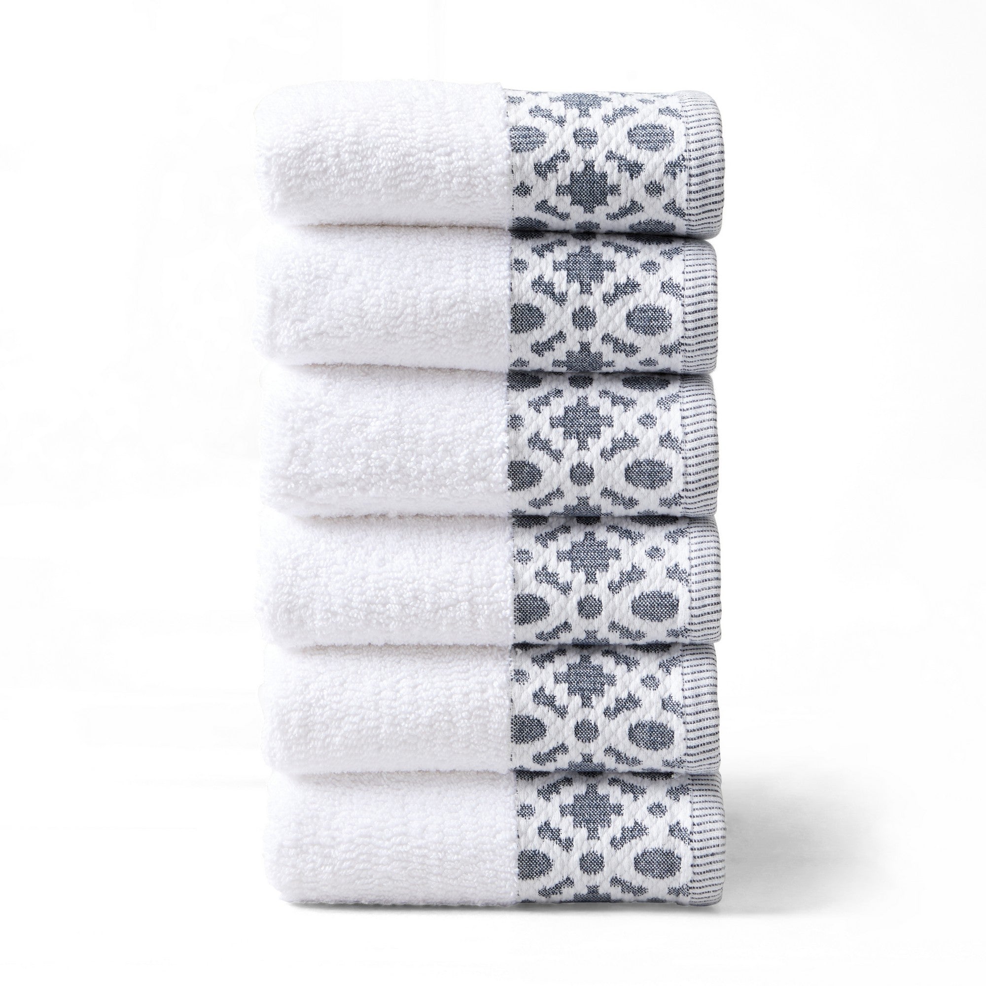 Nitra Collection Cotton Luxury Bath Towels by Market & Place featuring premium 100% cotton construction with an elegant geometric dobby border. Available in multiple colors and set configurations, including bath towels, hand towels, and washcloths, shown folded and stacked to highlight their soft, plush, and absorbent texture.