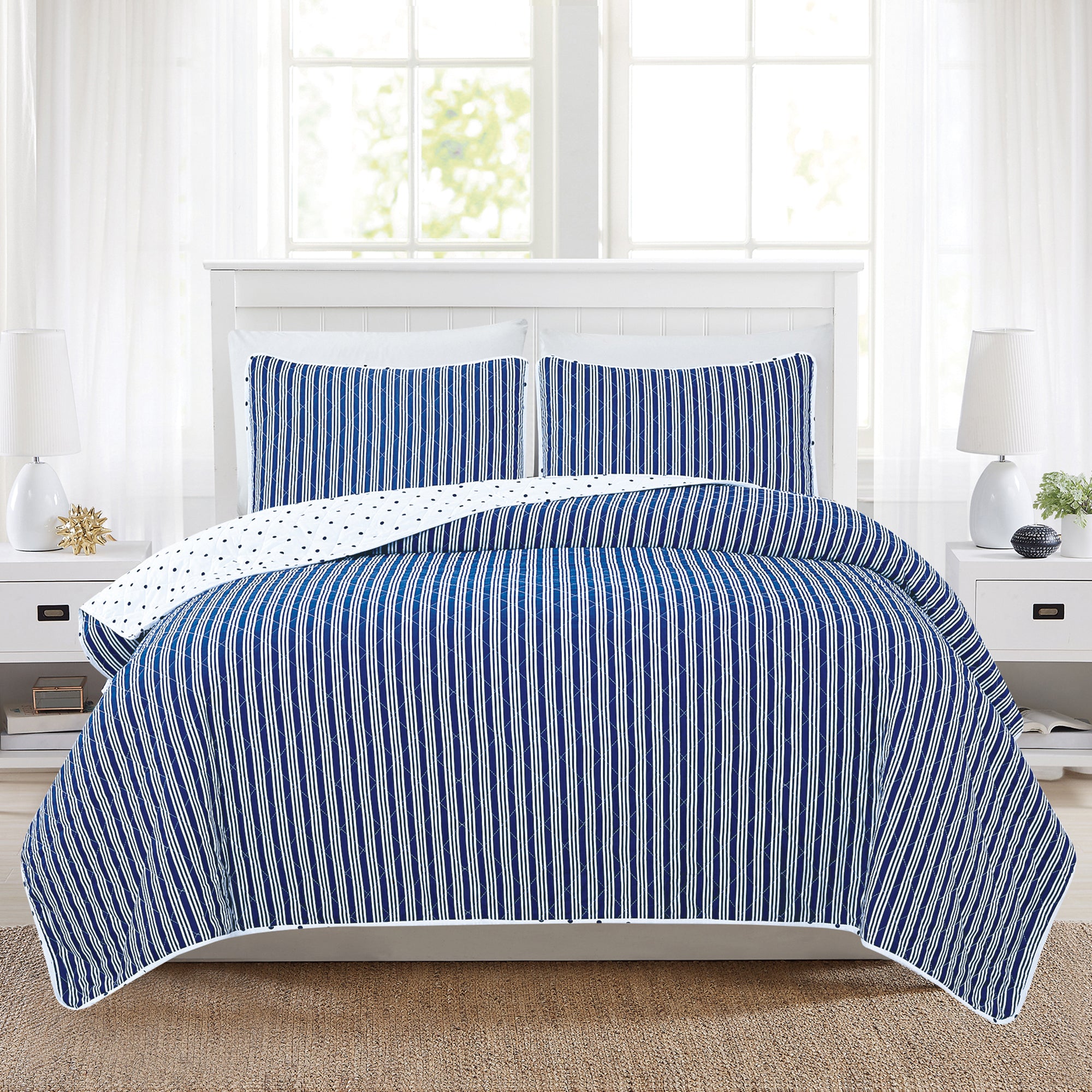 Nora Collection striped quilt set featuring classic striped patterns with a reversible dotted design, shown in multiple colorways and styling views. Soft, lightweight bedding with coordinating shams, displayed on beds and in close-up detail shots.
