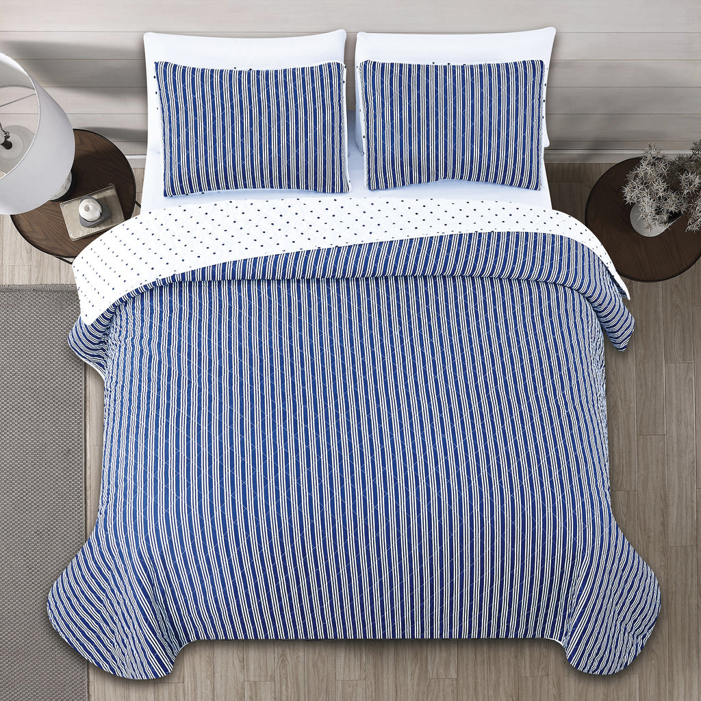 Nora Collection striped quilt set featuring classic striped patterns with a reversible dotted design, shown in multiple colorways and styling views. Soft, lightweight bedding with coordinating shams, displayed on beds and in close-up detail shots.