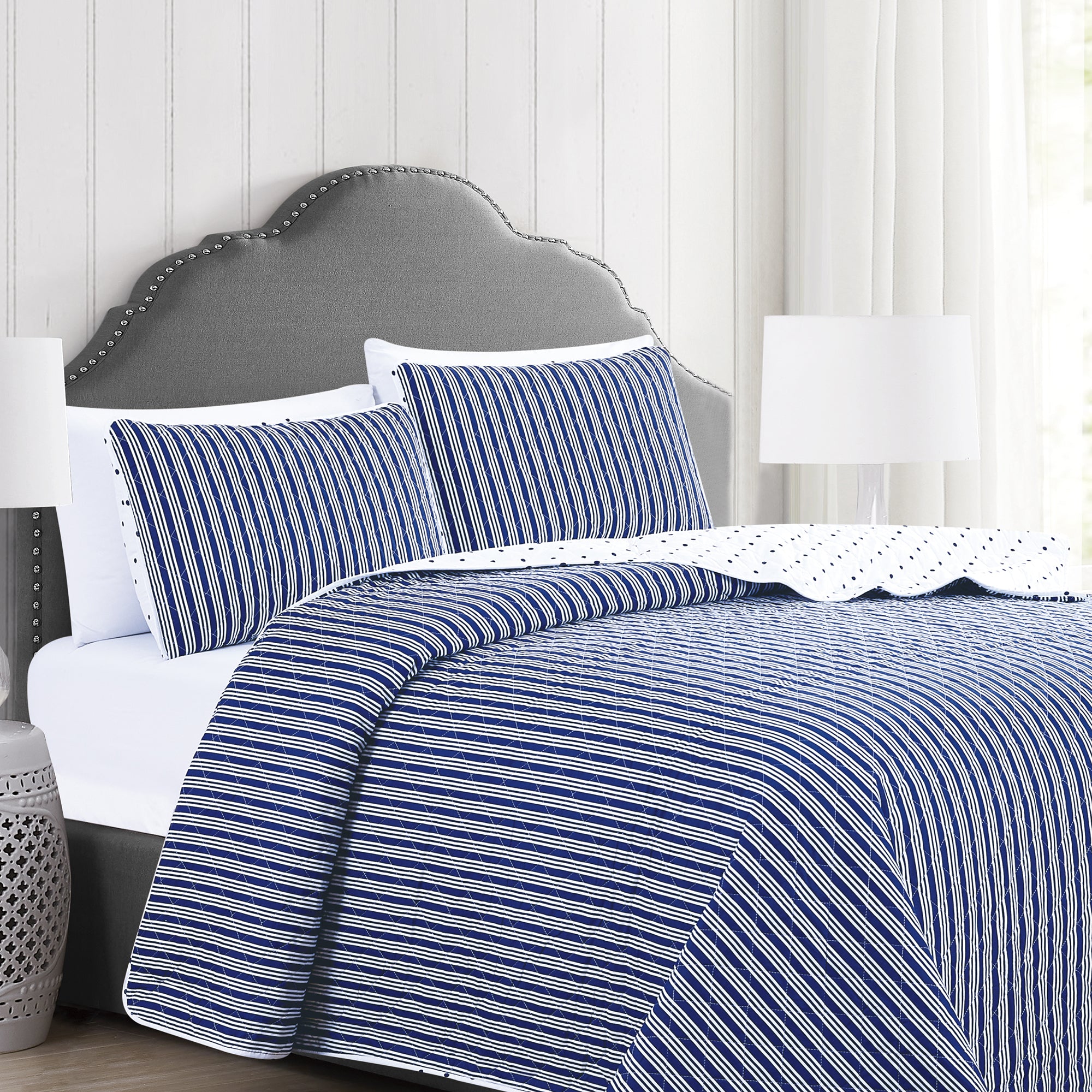 Nora Collection striped quilt set featuring classic striped patterns with a reversible dotted design, shown in multiple colorways and styling views. Soft, lightweight bedding with coordinating shams, displayed on beds and in close-up detail shots.