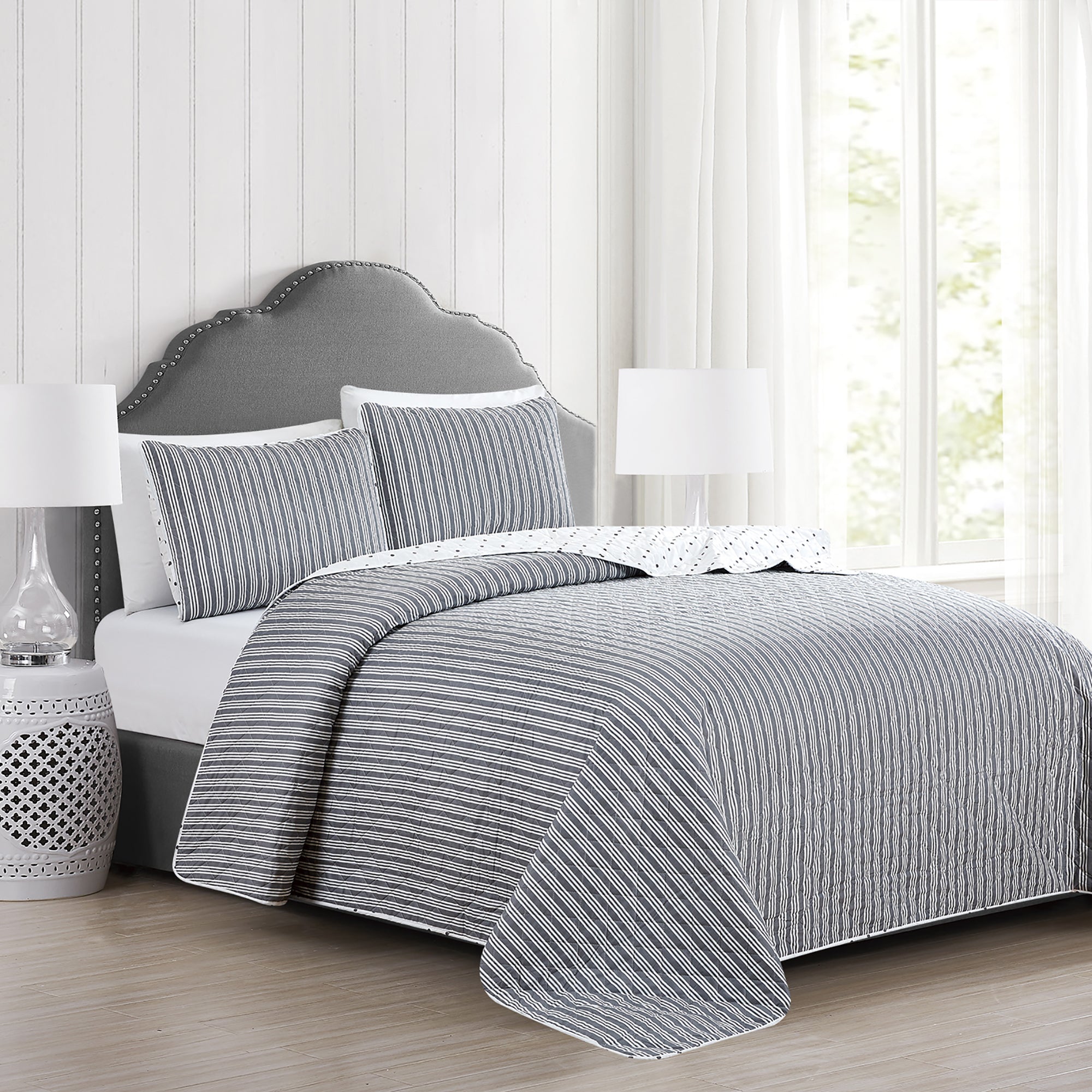 Nora Collection striped quilt set featuring classic striped patterns with a reversible dotted design, shown in multiple colorways and styling views. Soft, lightweight bedding with coordinating shams, displayed on beds and in close-up detail shots.