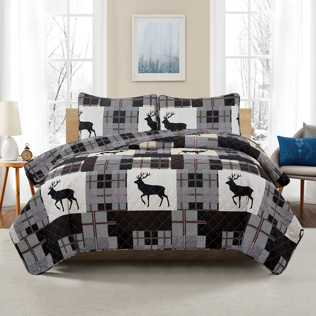 Everest Collection Lodge Quilt Set featuring rustic plaid patterns with deer motifs, shown in multiple styling views and close-up detail shots. Soft, reversible bedding with coordinating shams, designed to bring cozy cabin-inspired style and year-round comfort to the bedroom.