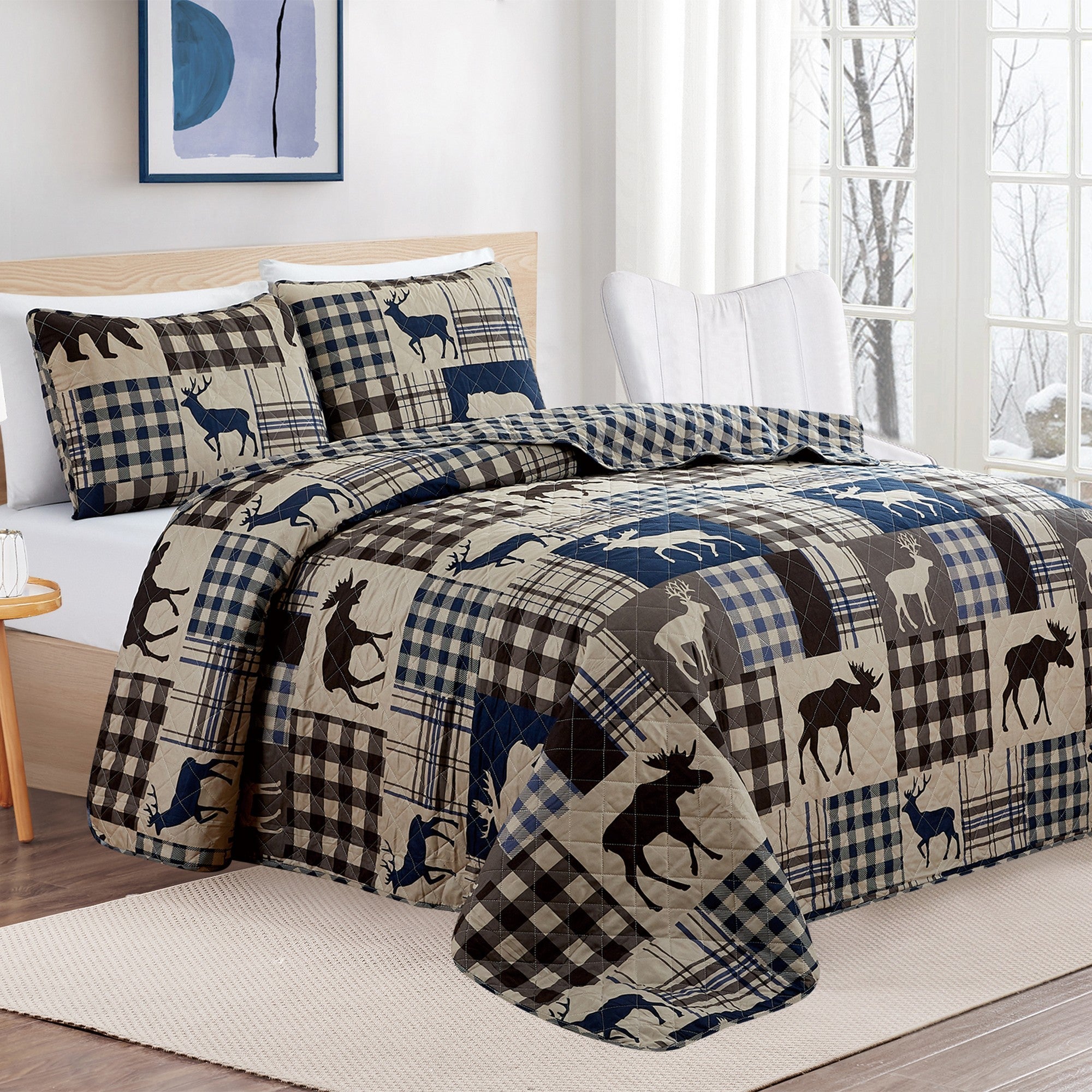 Reversible lodge quilt set featuring rustic plaid patterns and woodland-inspired motifs. Crafted with a soft microfiber shell and cotton-rich fill, this cozy bedding set includes matching sham(s) and brings cabin-inspired style to any bedroom.
