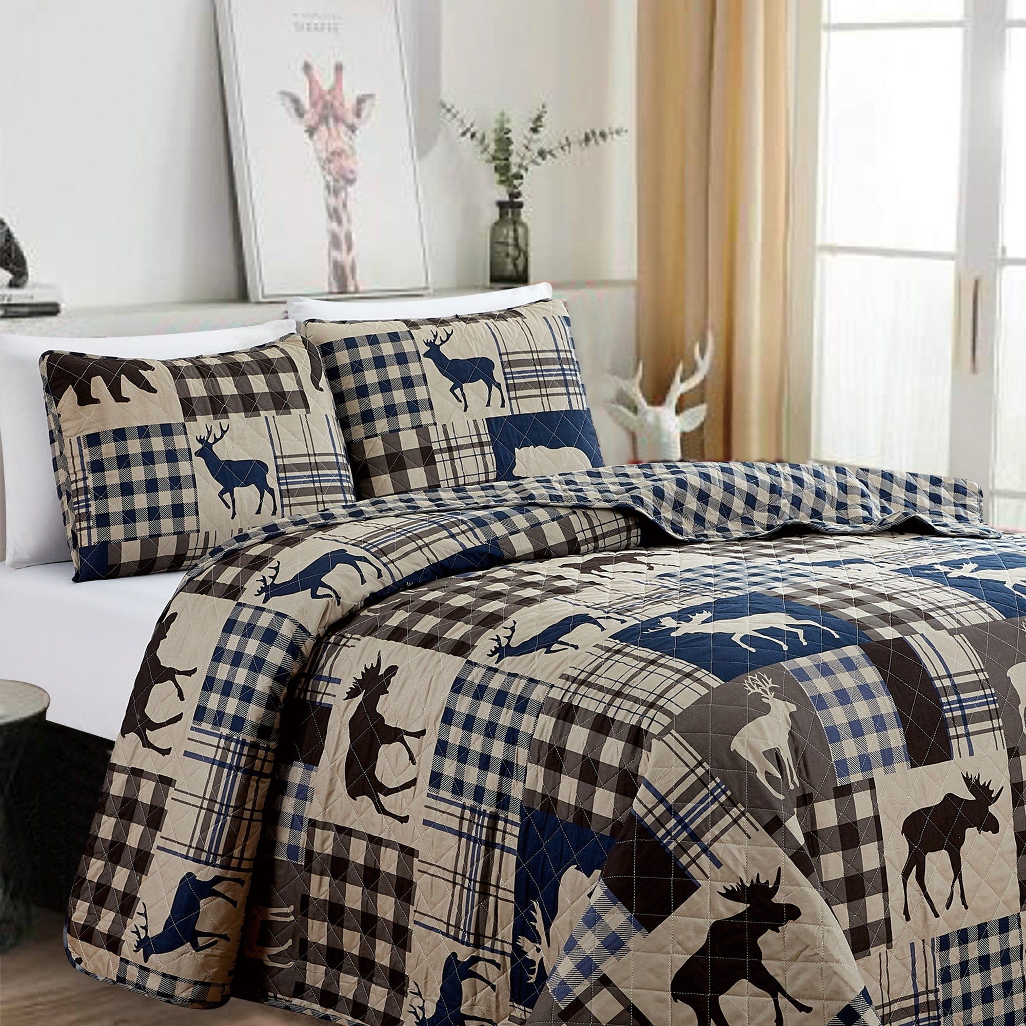 Reversible lodge quilt set featuring rustic plaid patterns and woodland-inspired motifs. Crafted with a soft microfiber shell and cotton-rich fill, this cozy bedding set includes matching sham(s) and brings cabin-inspired style to any bedroom.