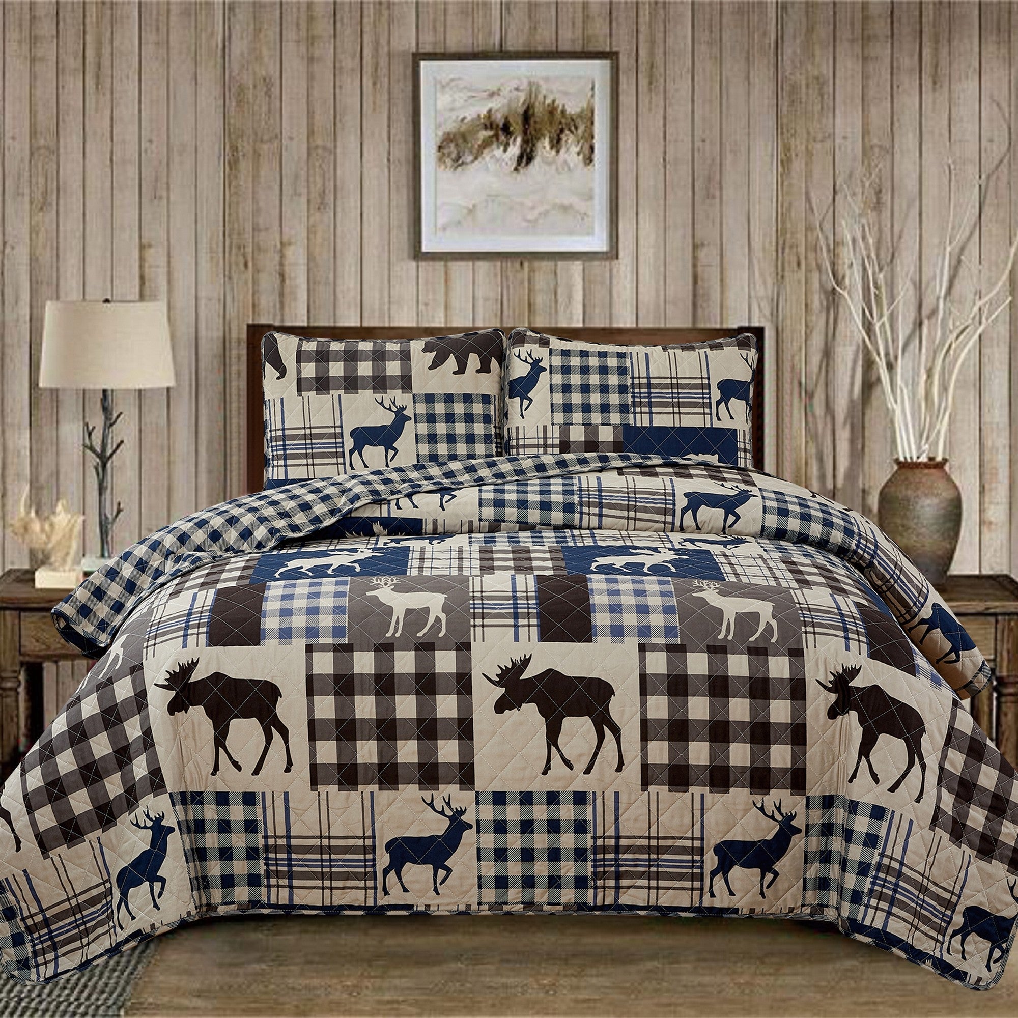 Reversible lodge quilt set featuring rustic plaid patterns and woodland-inspired motifs. Crafted with a soft microfiber shell and cotton-rich fill, this cozy bedding set includes matching sham(s) and brings cabin-inspired style to any bedroom.