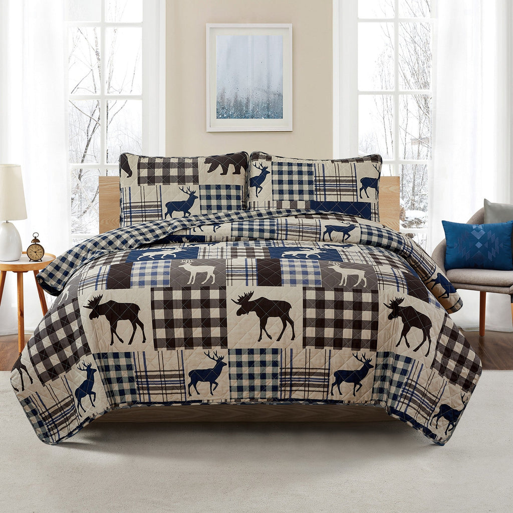 Reversible lodge quilt set featuring rustic plaid patterns and woodland-inspired motifs. Crafted with a soft microfiber shell and cotton-rich fill, this cozy bedding set includes matching sham(s) and brings cabin-inspired style to any bedroom.
