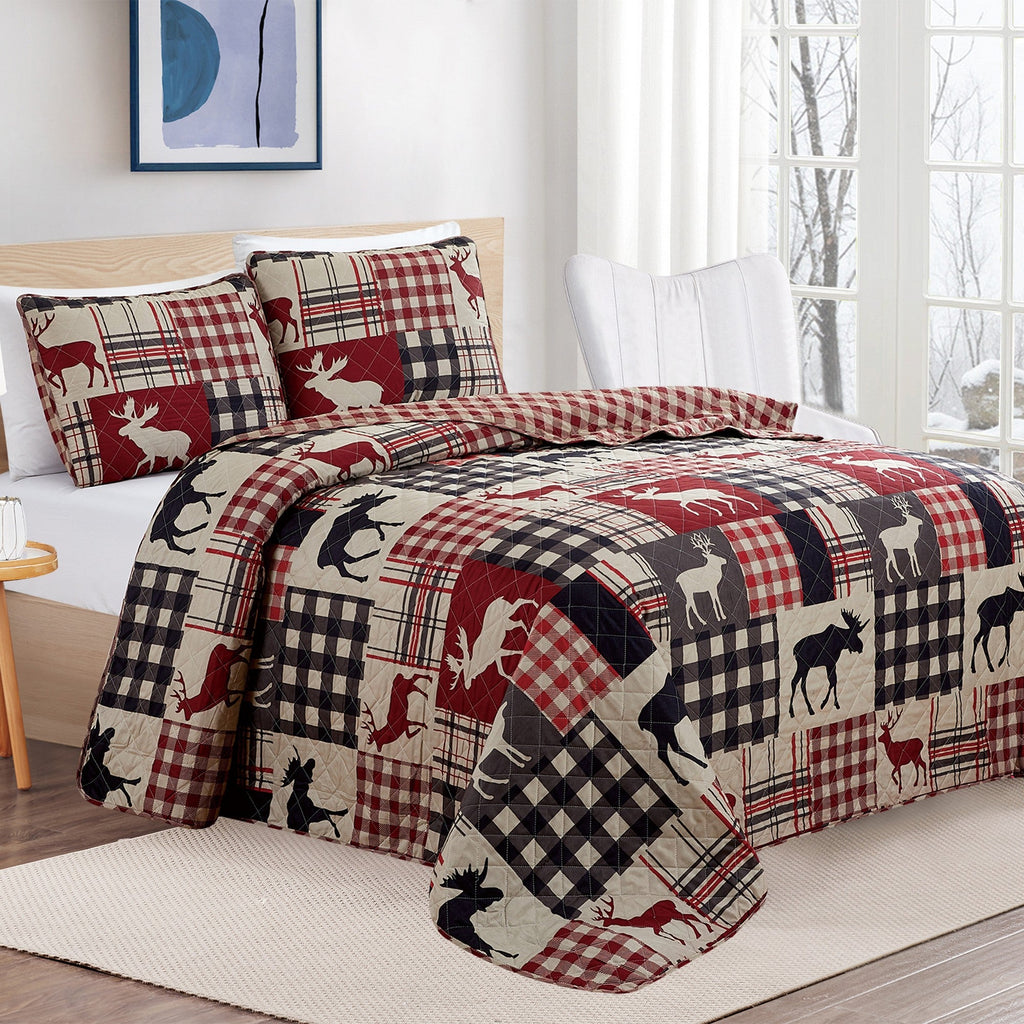 Reversible lodge quilt set featuring rustic plaid patterns and woodland-inspired motifs. Crafted with a soft microfiber shell and cotton-rich fill, this cozy bedding set includes matching sham(s) and brings cabin-inspired style to any bedroom.