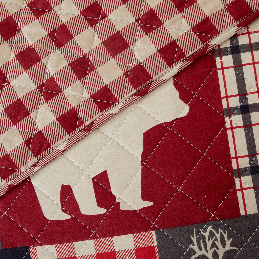 Redington Collection Bear Lodge Quilt Set featuring rustic patchwork designs with bear motifs and plaid patterns, shown in multiple colorways and styling views. Soft, reversible bedding with coordinating shams, displayed on beds and in close-up detail shots.