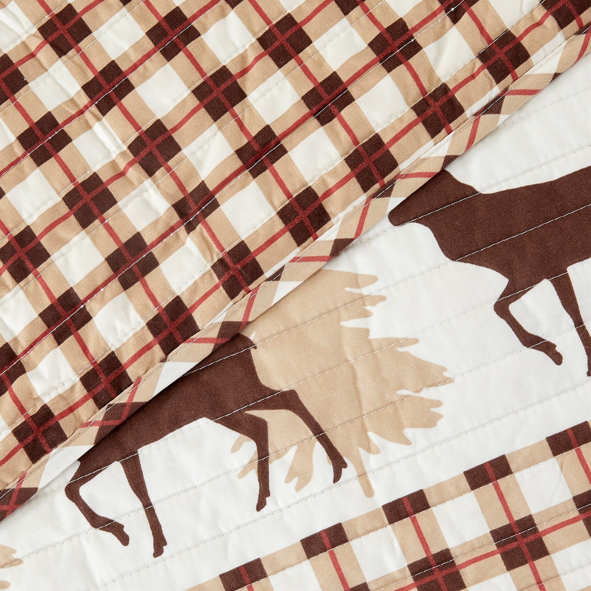 Cedar Creek Collection Lodge Quilt Set featuring rustic woodland-inspired patterns with bears, deer, trees, and plaid accents, shown in multiple colorways and styling views. Soft, reversible bedding with coordinating shams, displayed on beds and in close-up detail shots.