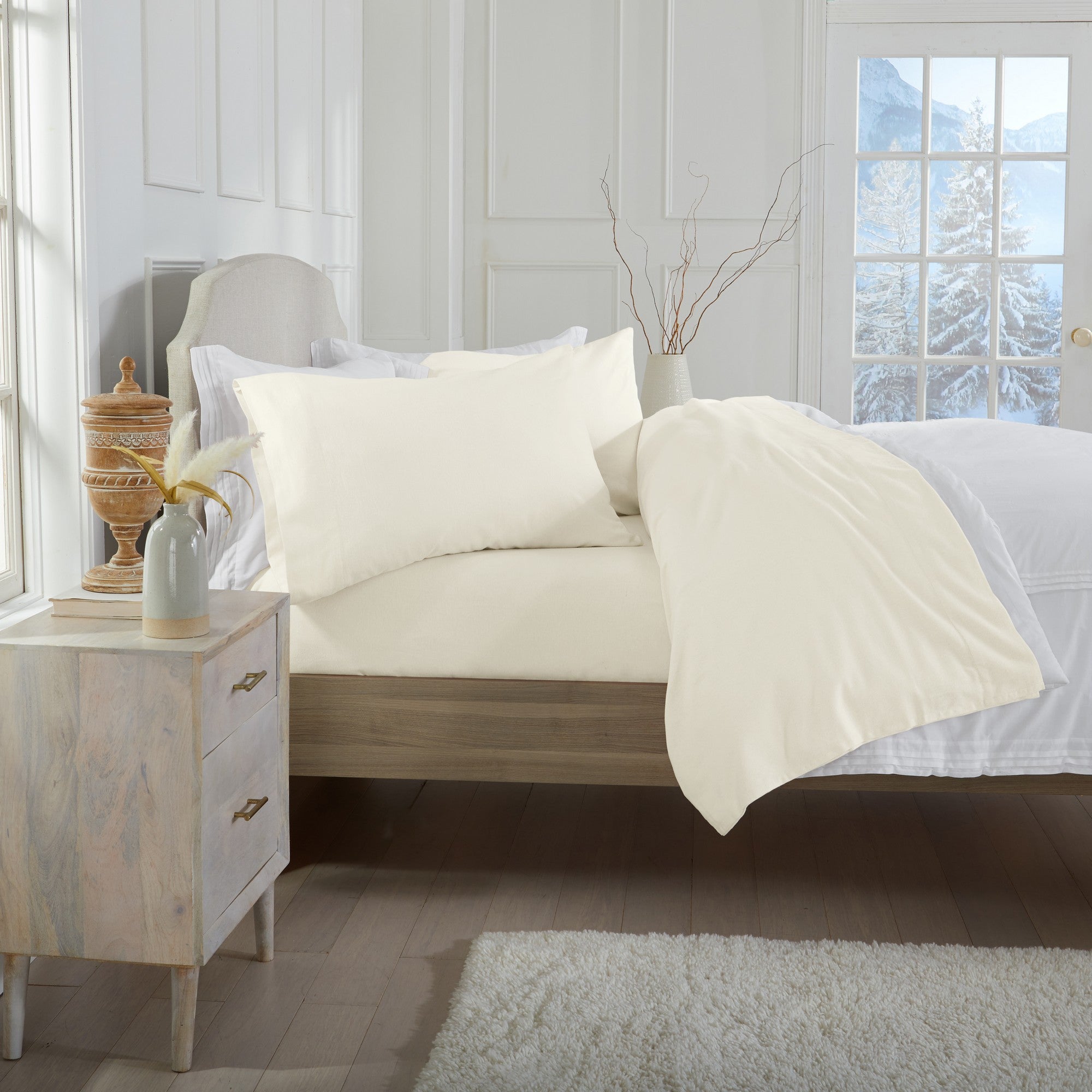 Chalet Collection Solid Flannel Sheet Set in assorted solid colors, featuring ultra-soft 100% Turkish cotton flannel bedding with coordinating pillowcases and fitted sheets, shown styled on beds and folded for detail views.