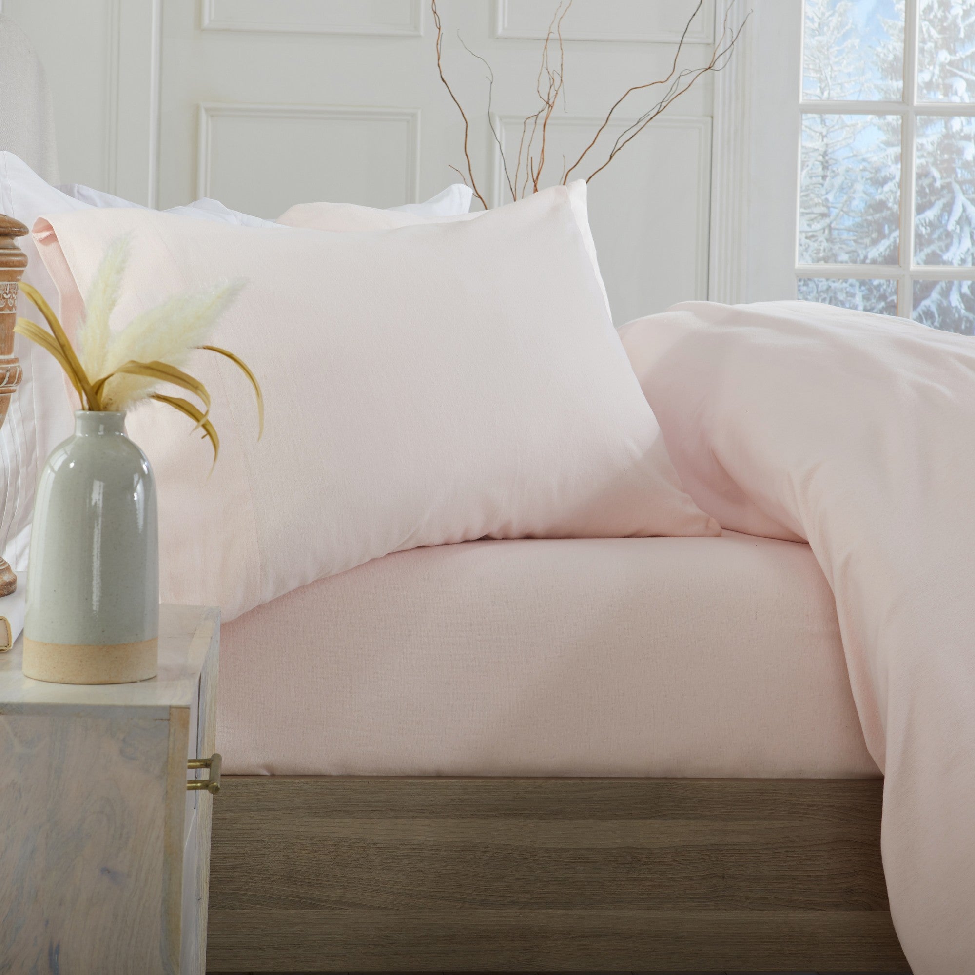 Chalet Collection Solid Flannel Sheet Set in assorted solid colors, featuring ultra-soft 100% Turkish cotton flannel bedding with coordinating pillowcases and fitted sheets, shown styled on beds and folded for detail views.