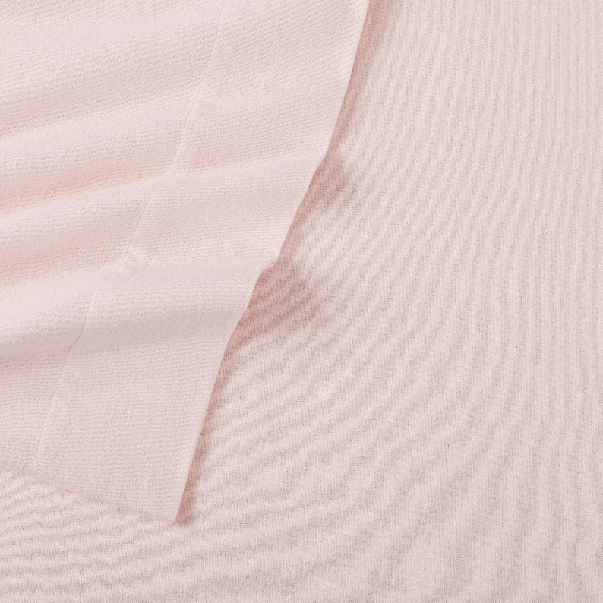 Chalet Collection Solid Flannel Sheet Set in assorted solid colors, featuring ultra-soft 100% Turkish cotton flannel bedding with coordinating pillowcases and fitted sheets, shown styled on beds and folded for detail views.