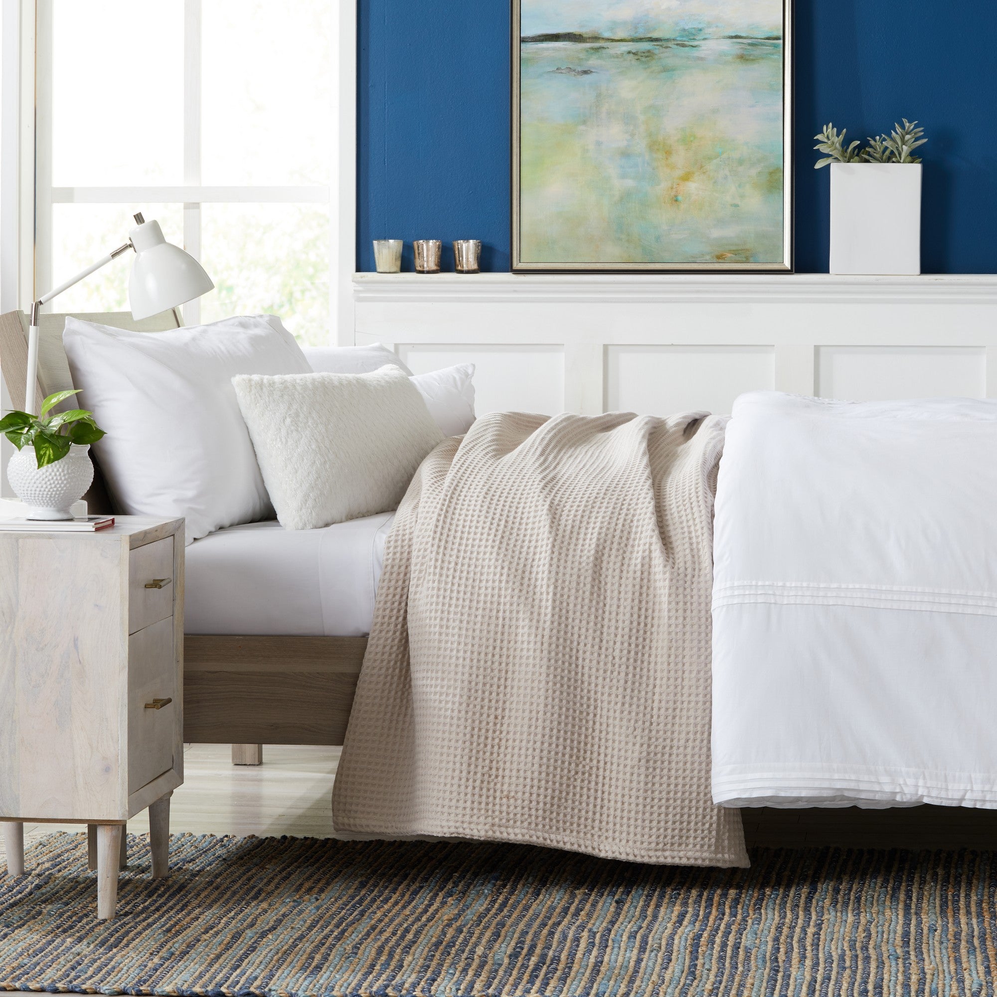 Brielle Collection Cotton Waffle Blanket by Market & Place featuring soft, breathable 100% cotton construction with a classic waffle weave texture. Available in multiple colors and shown folded, layered on beds, and in detailed fabric close-ups, highlighting its lightweight comfort and versatile year-round style.
