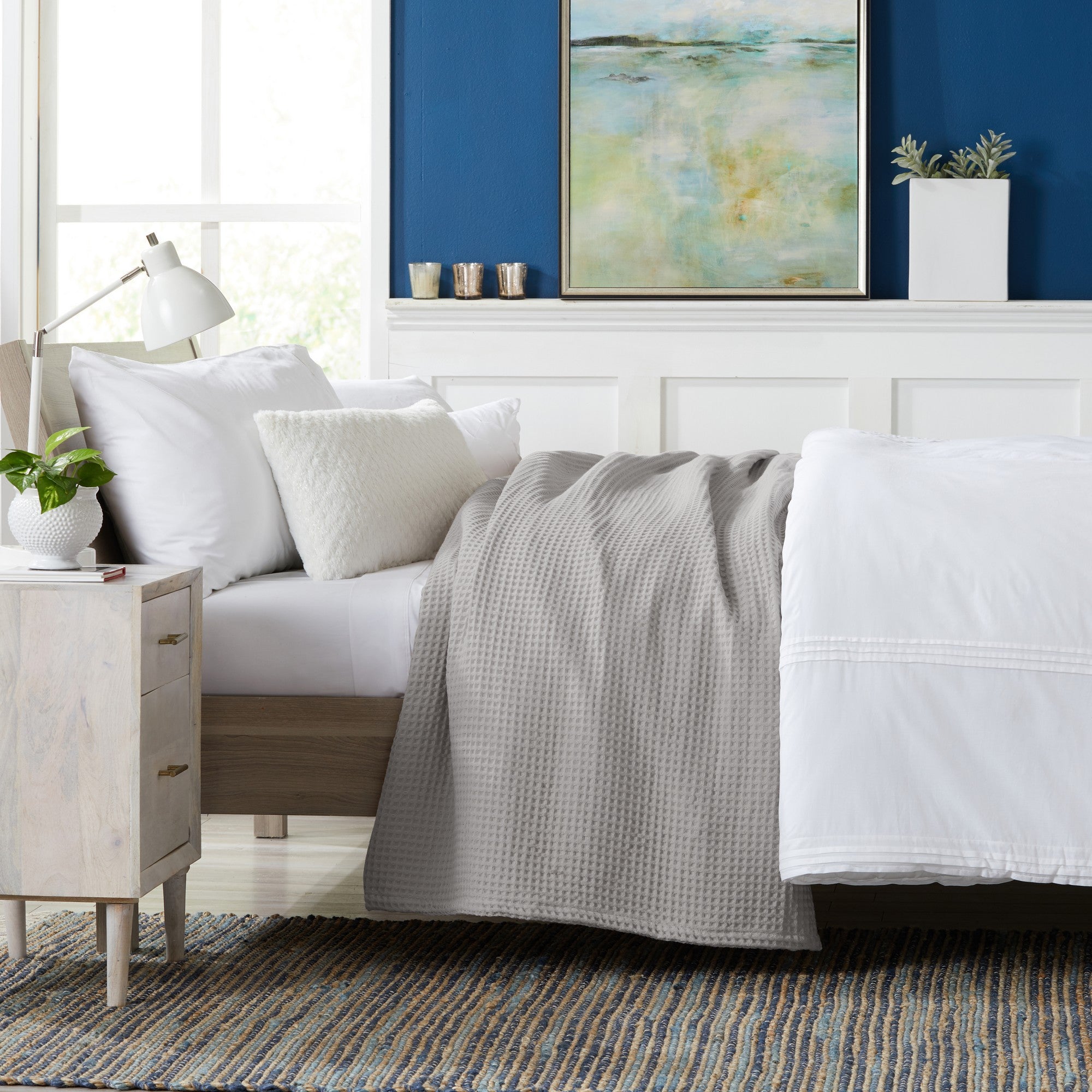 Brielle Collection Cotton Waffle Blanket by Market & Place featuring soft, breathable 100% cotton construction with a classic waffle weave texture. Available in multiple colors and shown folded, layered on beds, and in detailed fabric close-ups, highlighting its lightweight comfort and versatile year-round style.