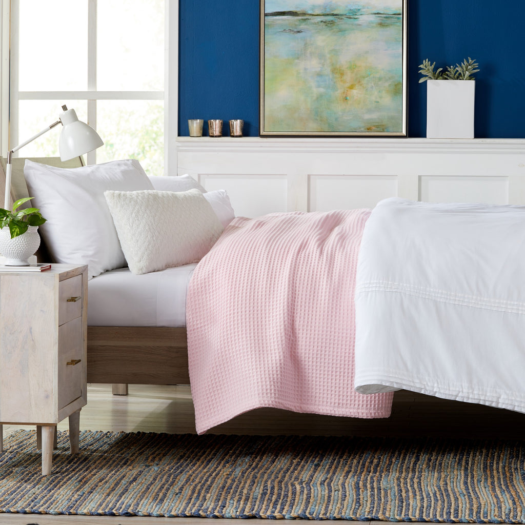 Brielle Collection Cotton Waffle Blanket by Market & Place featuring soft, breathable 100% cotton construction with a classic waffle weave texture. Available in multiple colors and shown folded, layered on beds, and in detailed fabric close-ups, highlighting its lightweight comfort and versatile year-round style.