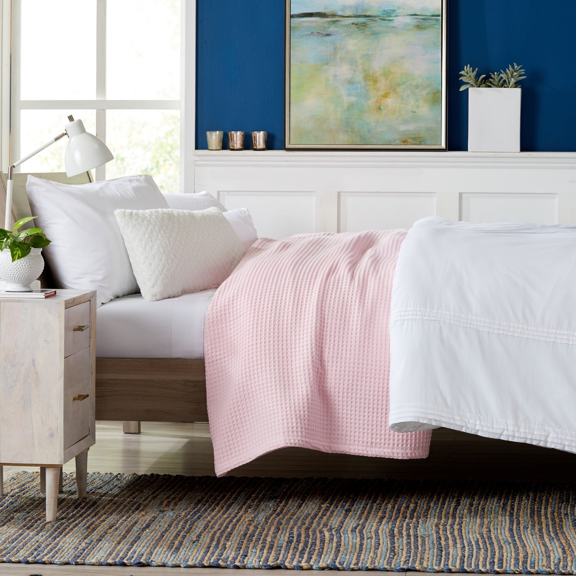 Brielle Collection Cotton Waffle Blanket by Market & Place featuring soft, breathable 100% cotton construction with a classic waffle weave texture. Available in multiple colors and shown folded, layered on beds, and in detailed fabric close-ups, highlighting its lightweight comfort and versatile year-round style.