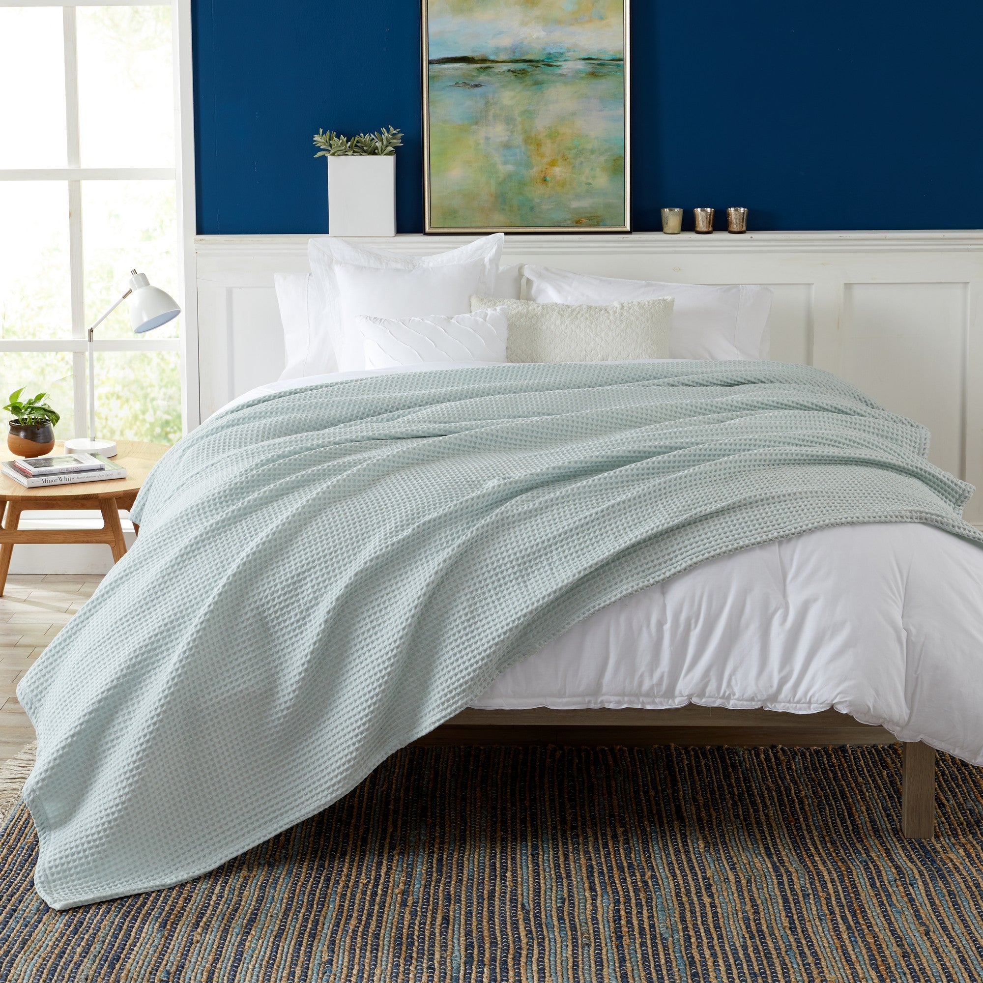 Brielle Collection Cotton Waffle Blanket by Market & Place featuring soft, breathable 100% cotton construction with a classic waffle weave texture. Available in multiple colors and shown folded, layered on beds, and in detailed fabric close-ups, highlighting its lightweight comfort and versatile year-round style.